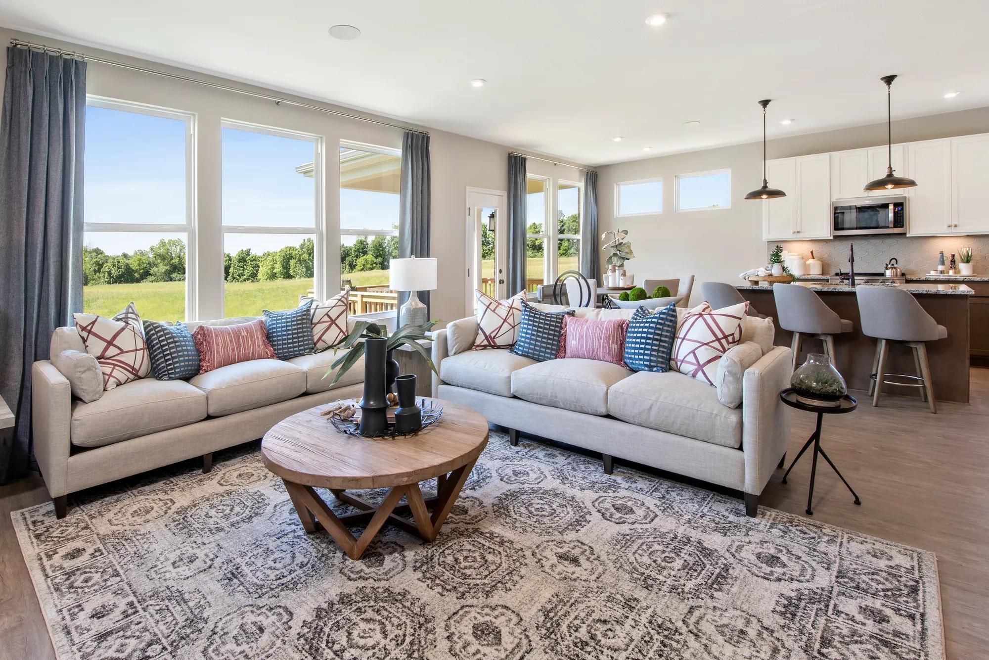 family room with wall of windows