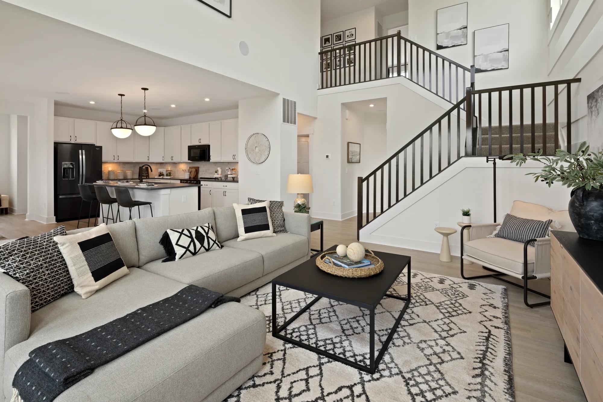 two-story family room open to the kitchen and breakfast room