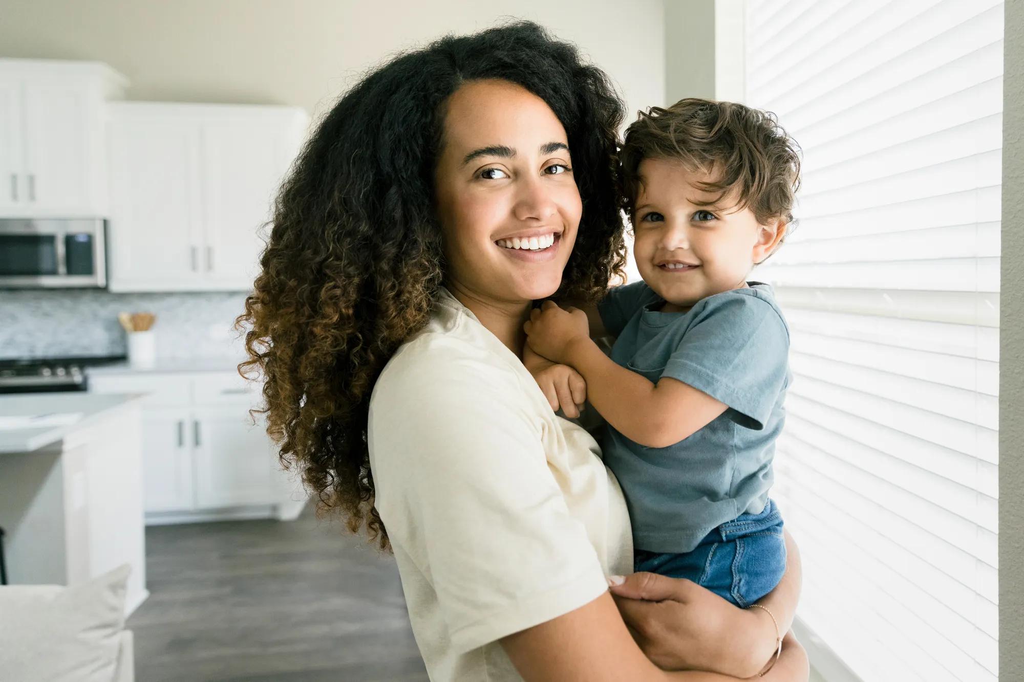 Mother and son in home