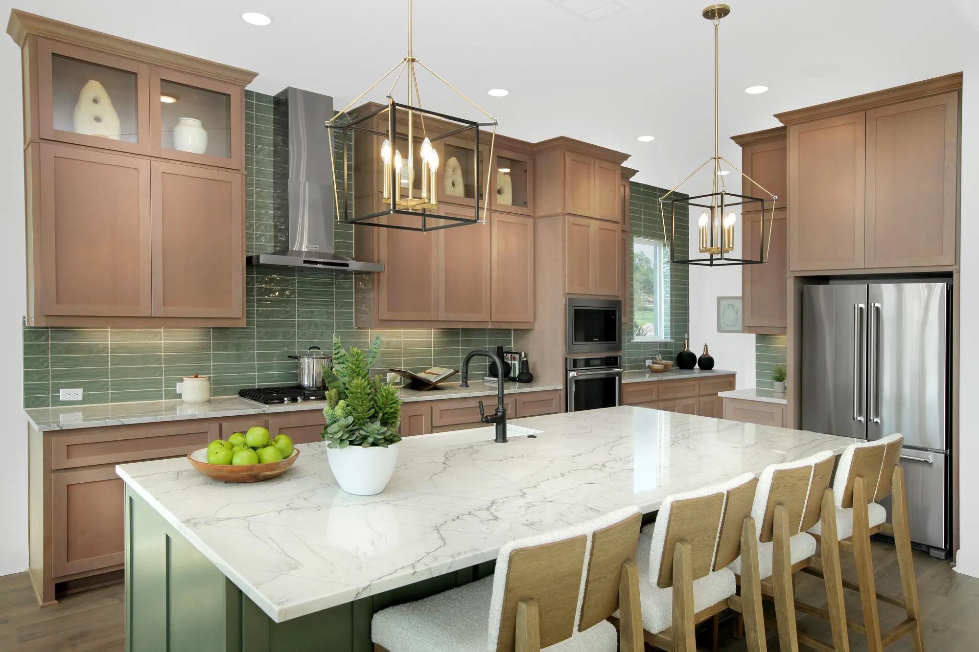 new home kitchen with light wood cabinets