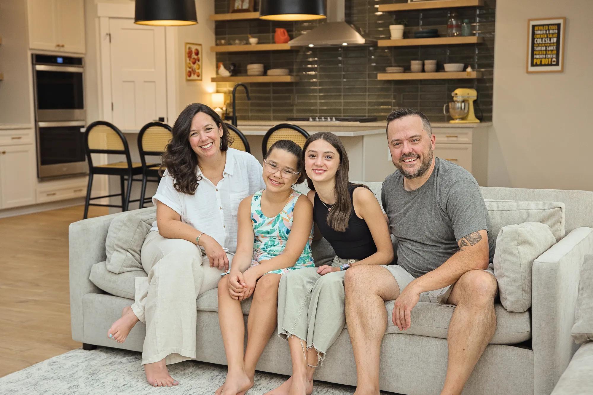 New homeowners in the Alden family room