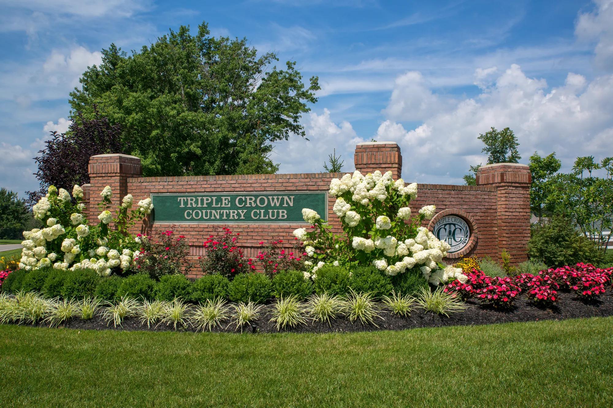 Community entrance monument with landscaping