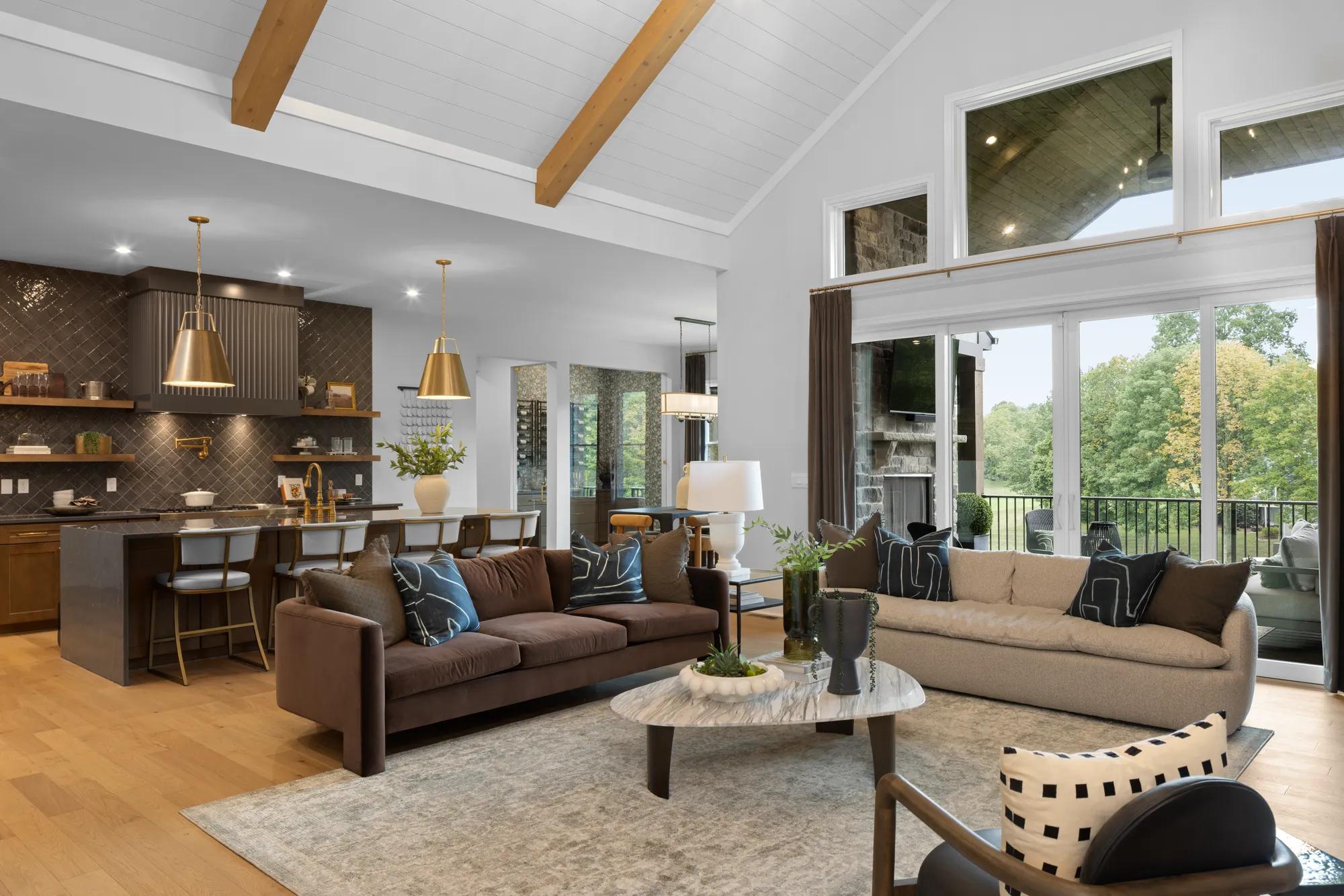 Custom home open floor plan family room with wall of windows