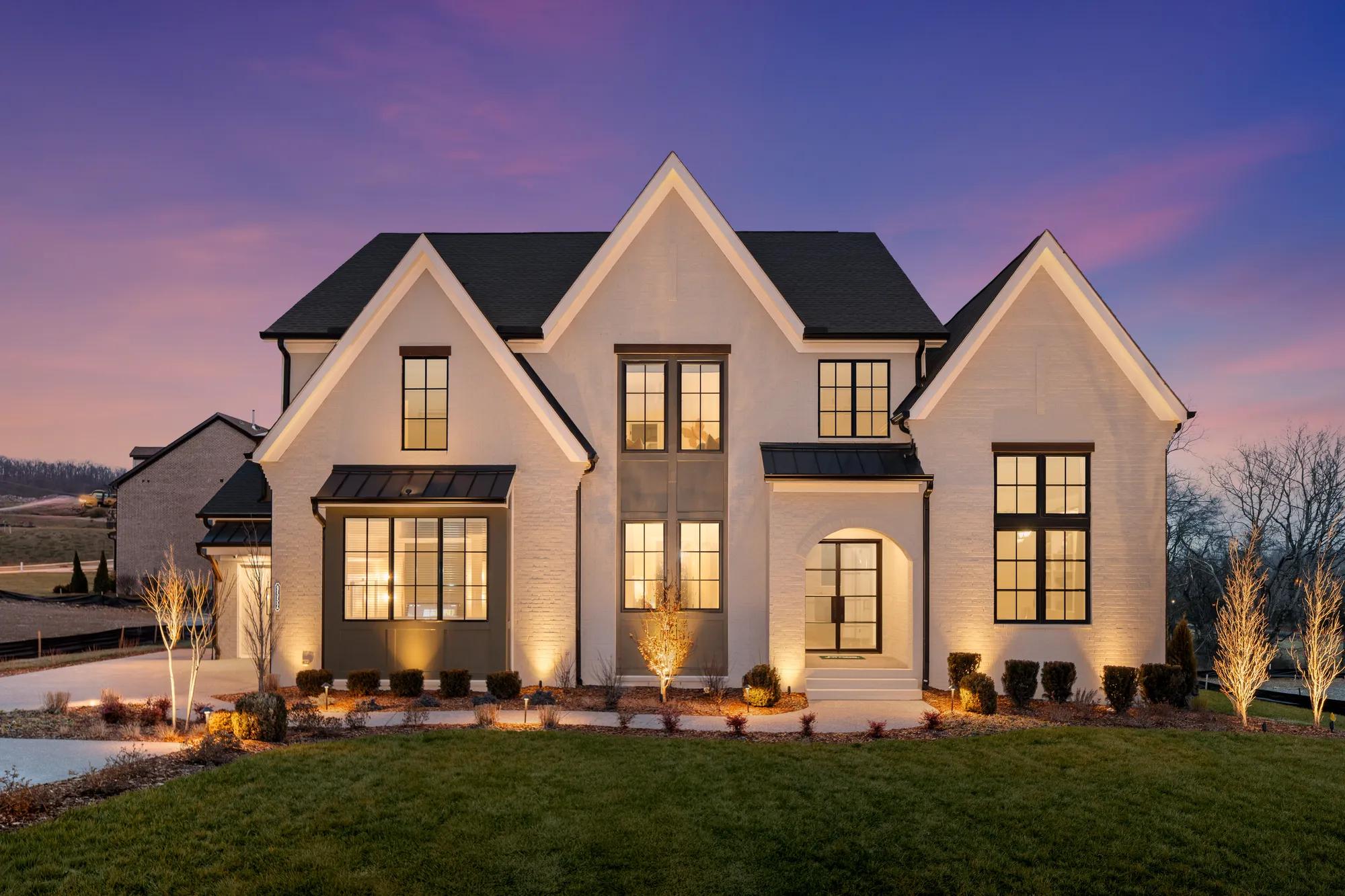 Custom two-story home at night