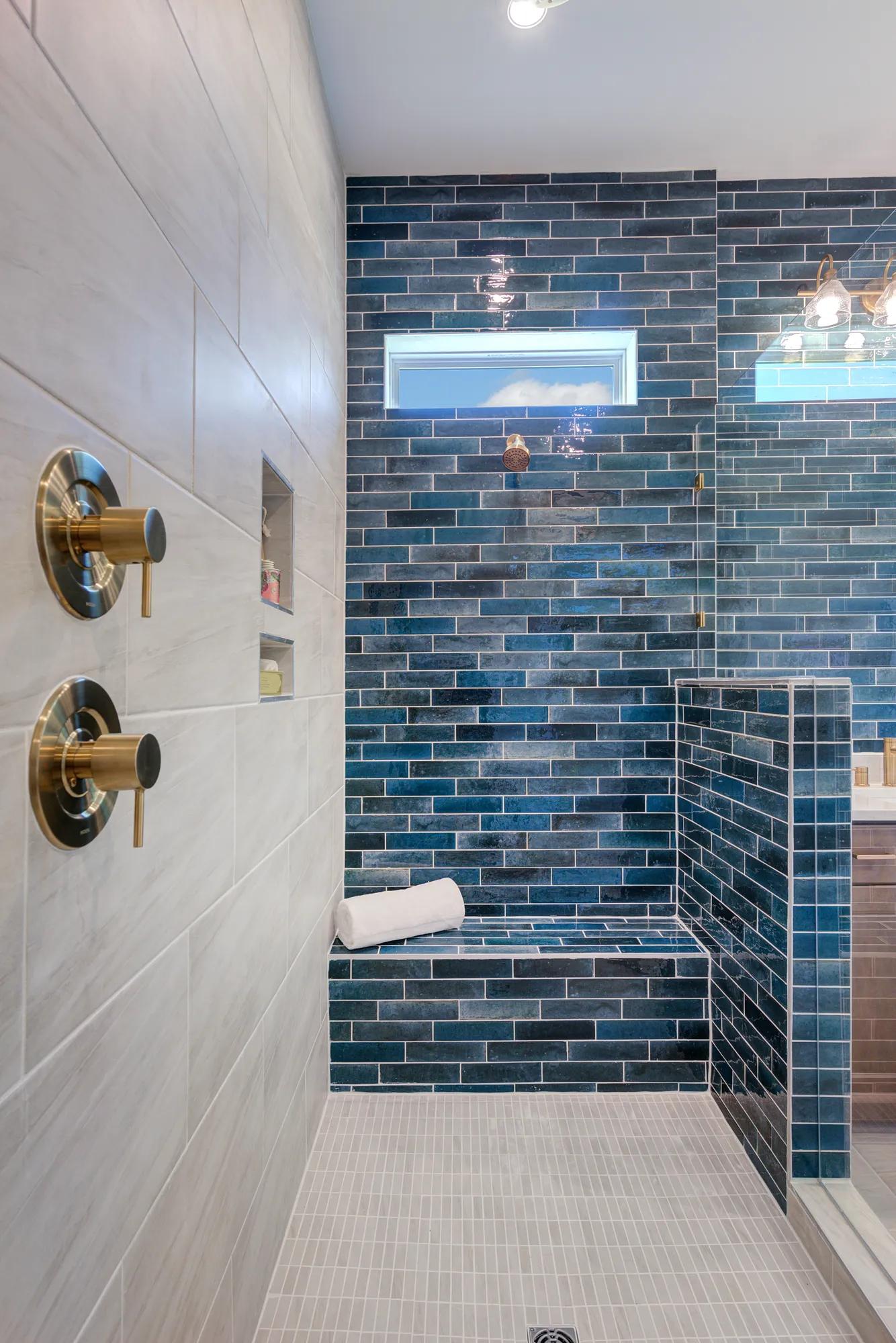 new construction home primary bath with blue tile accents