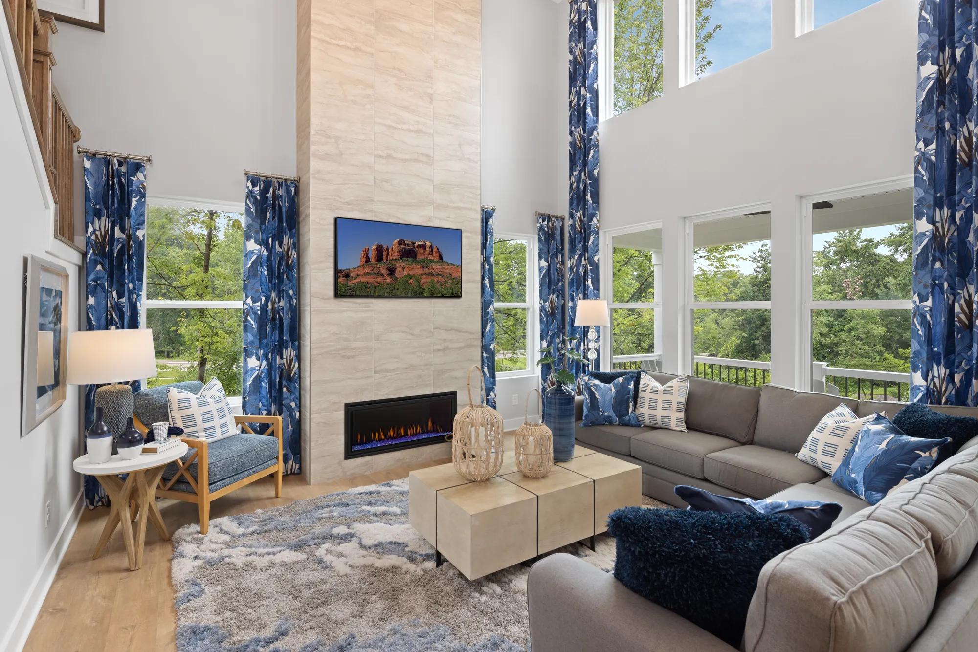 two-story family room with wall of windows