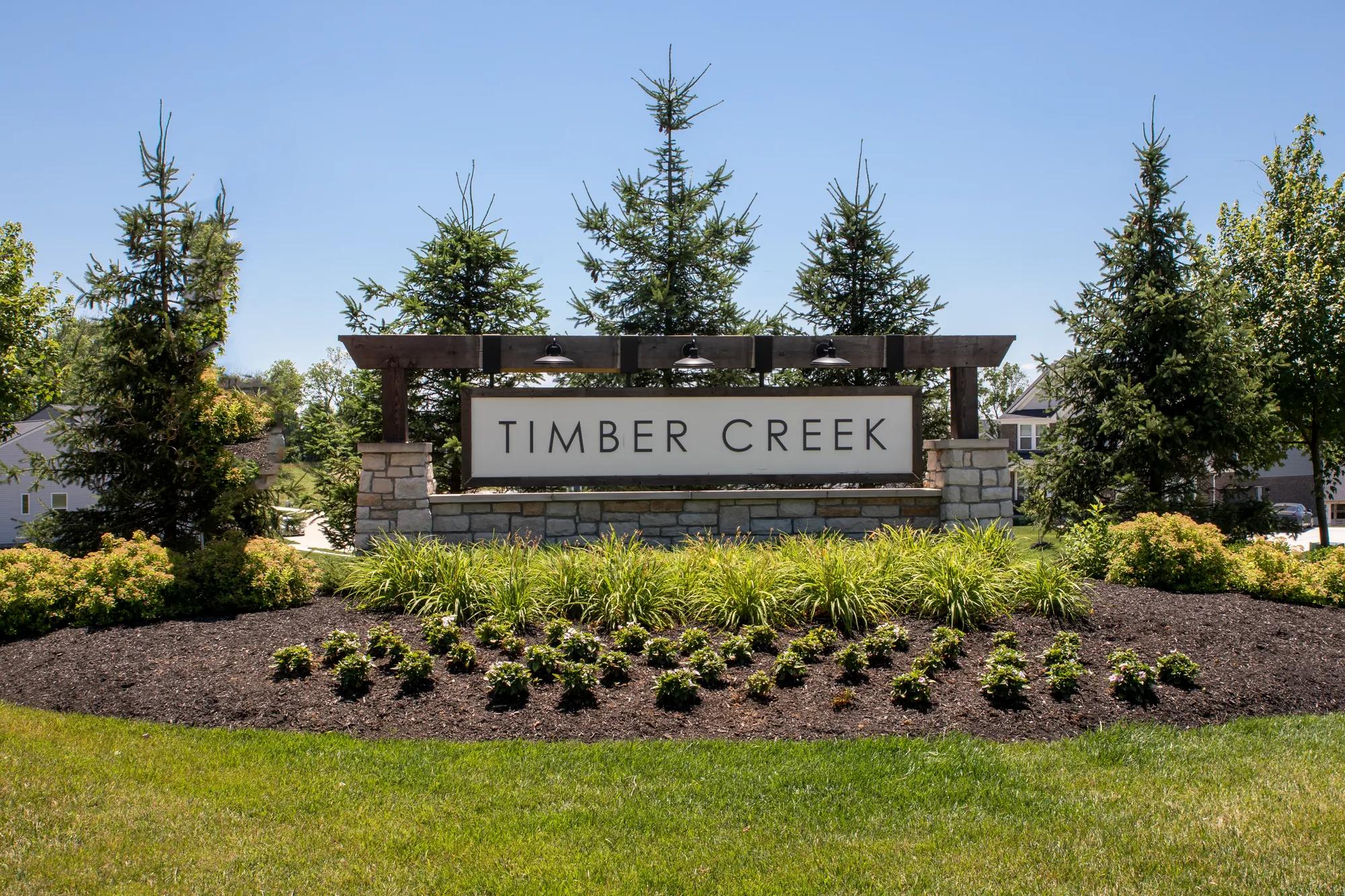 community entrance with stone monument