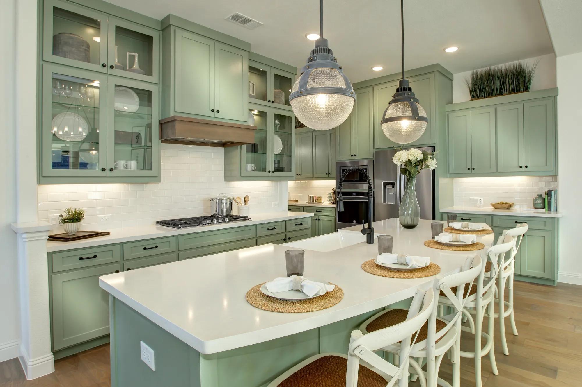 Kitchen with island and painted cabinets