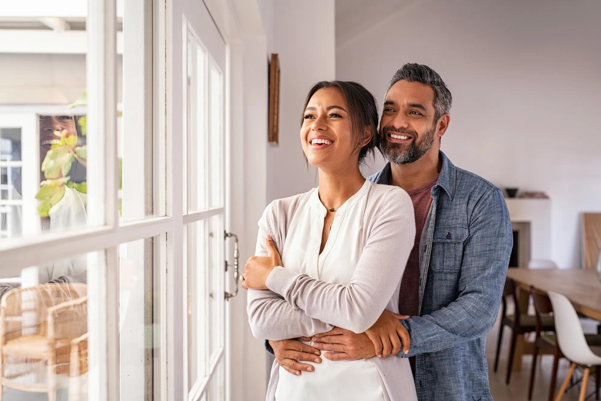 Happy couple in new home