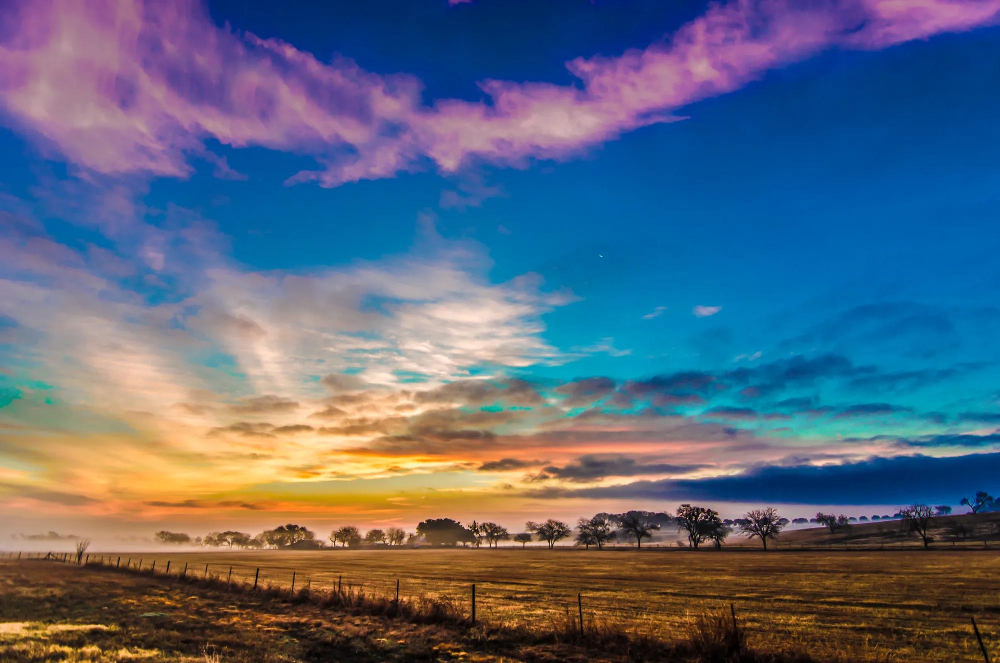 Sunrise over Texas ranch