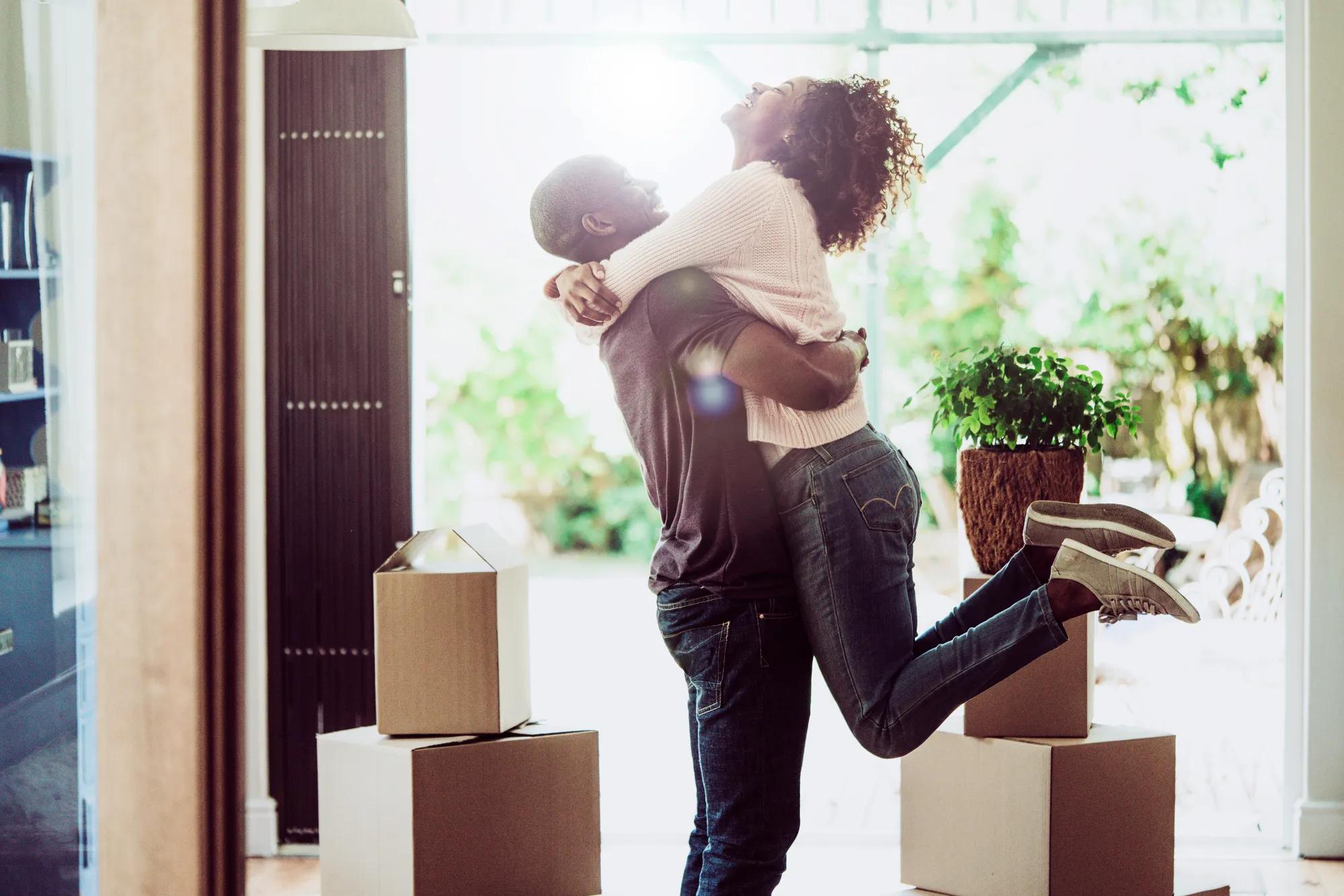 Happy couple in new home