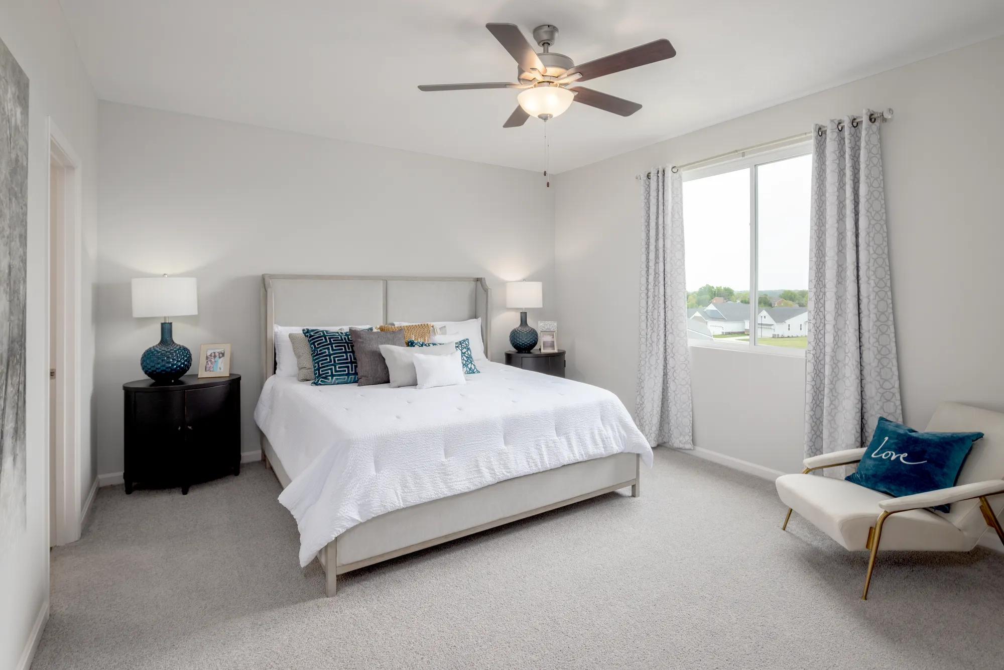 primary bedroom with adjoining bath