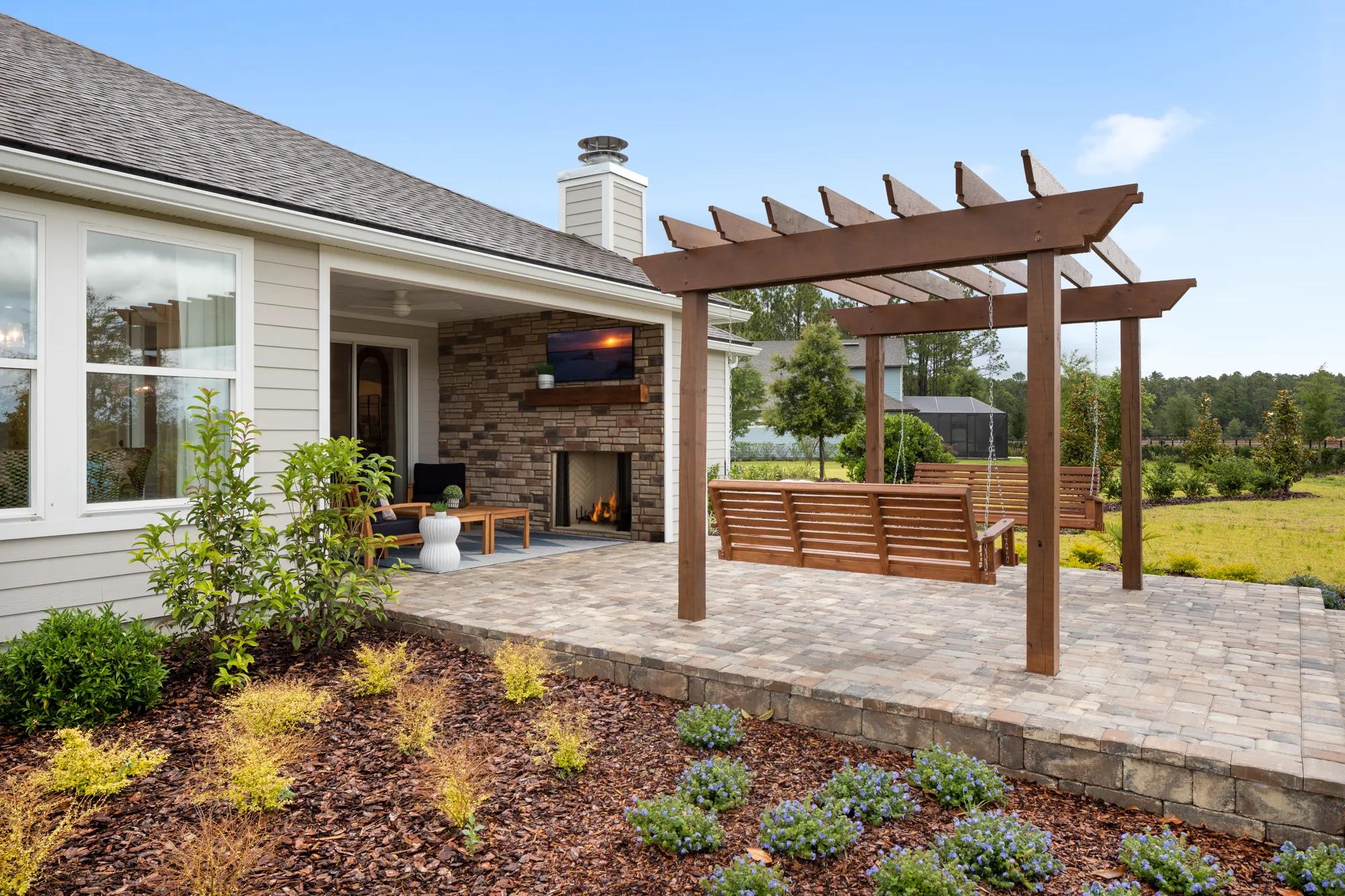covered patio and pergola with swings