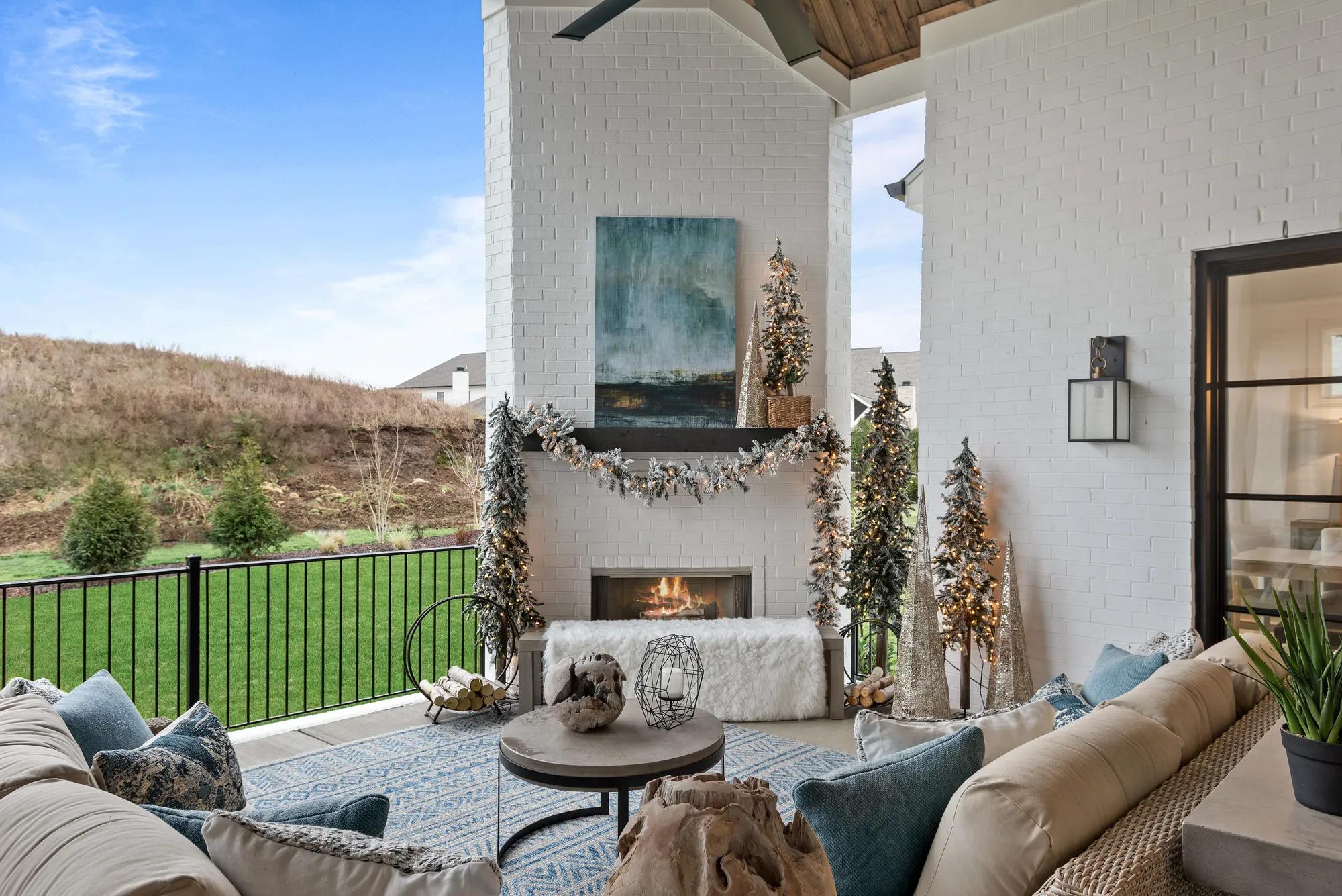 outdoor living area decorated for the holidays