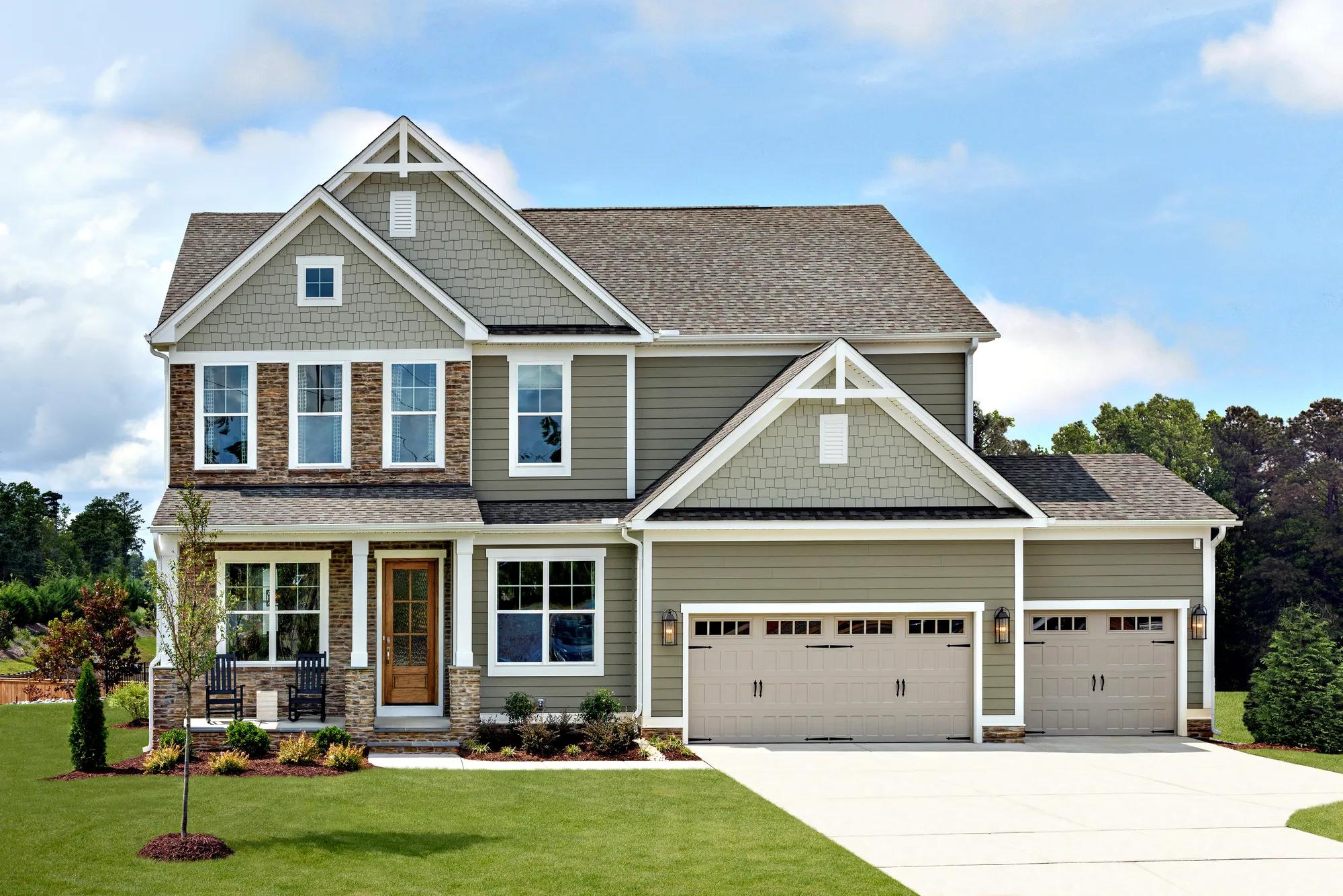 two-story home with three-car garage