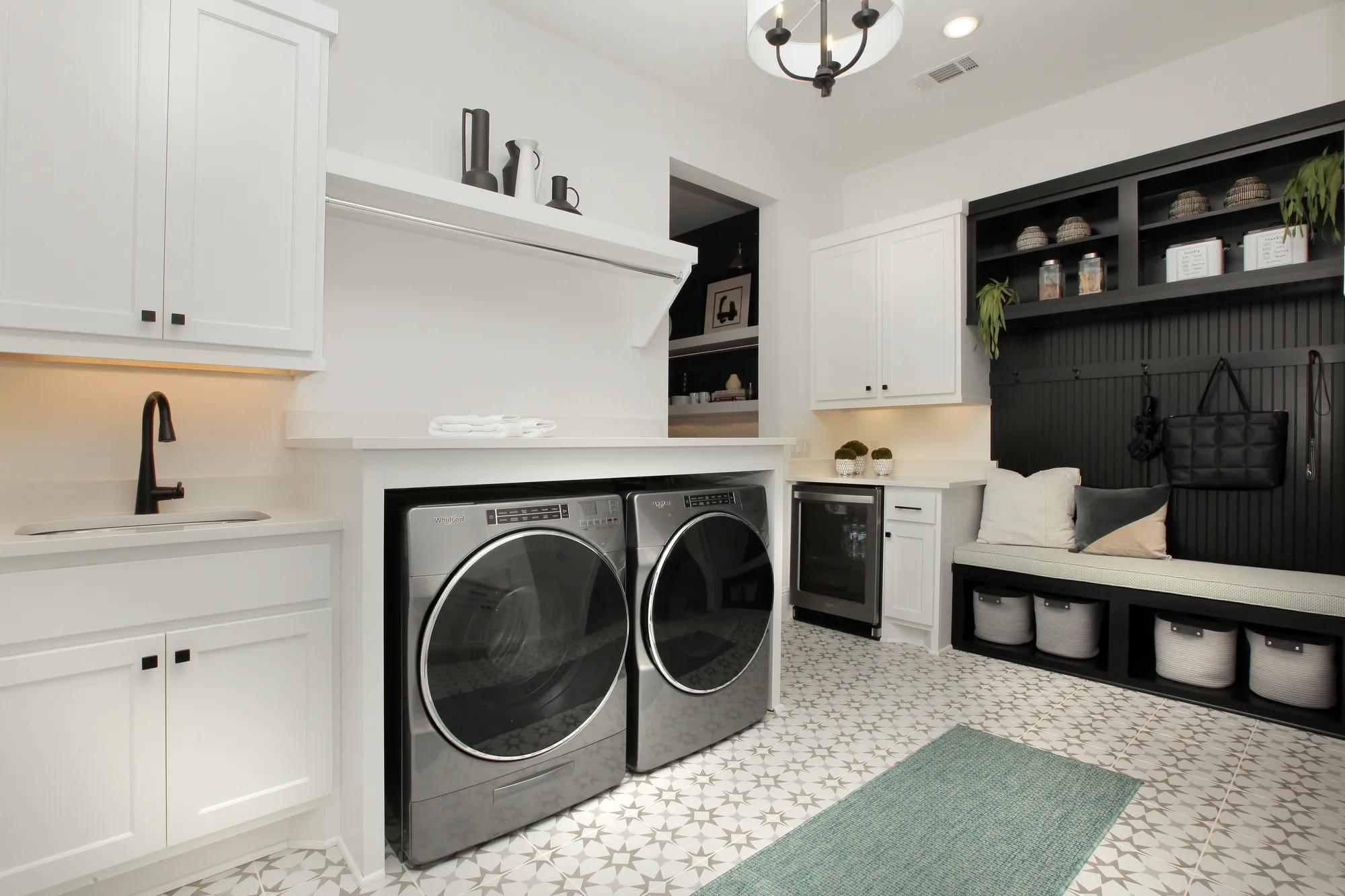 laundry room with bench and coat hooks