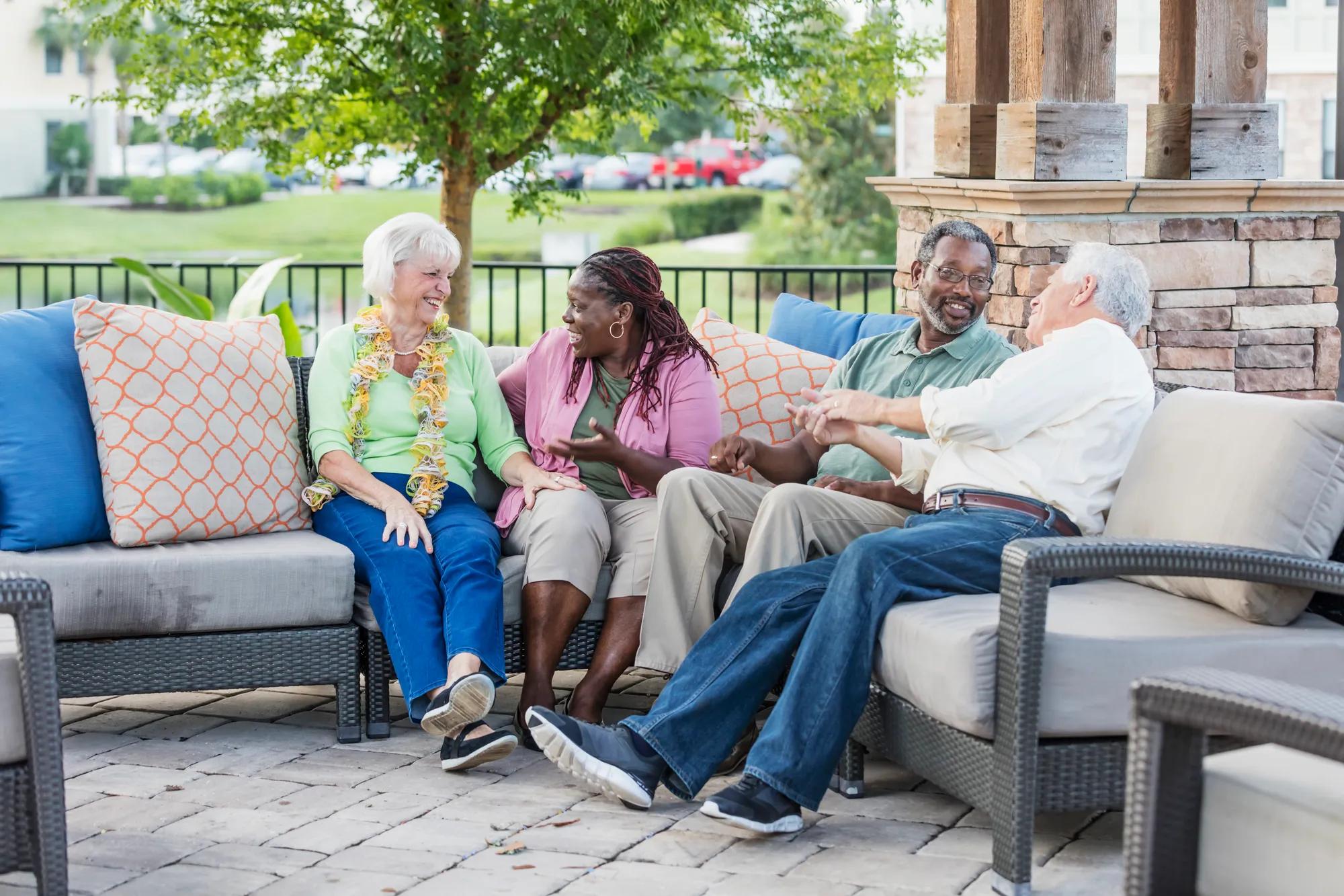 Couples enjoying their new home's outdoor living area
