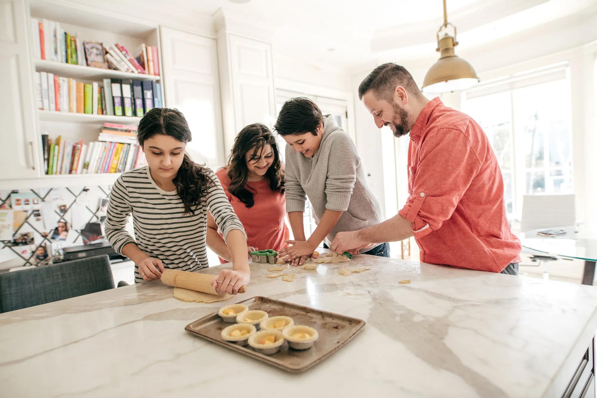 Family baking together in home