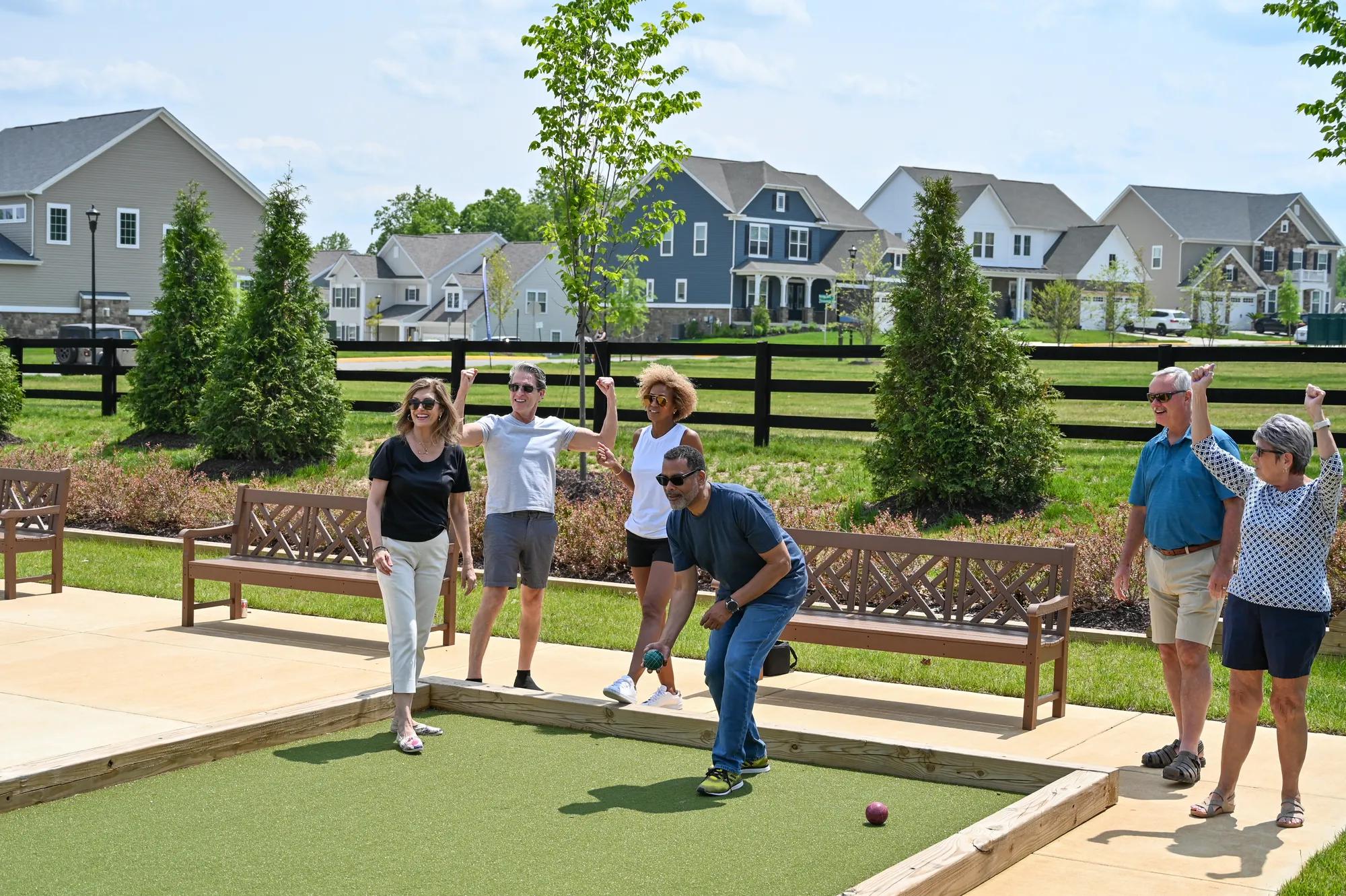 active adults playing bocce ball