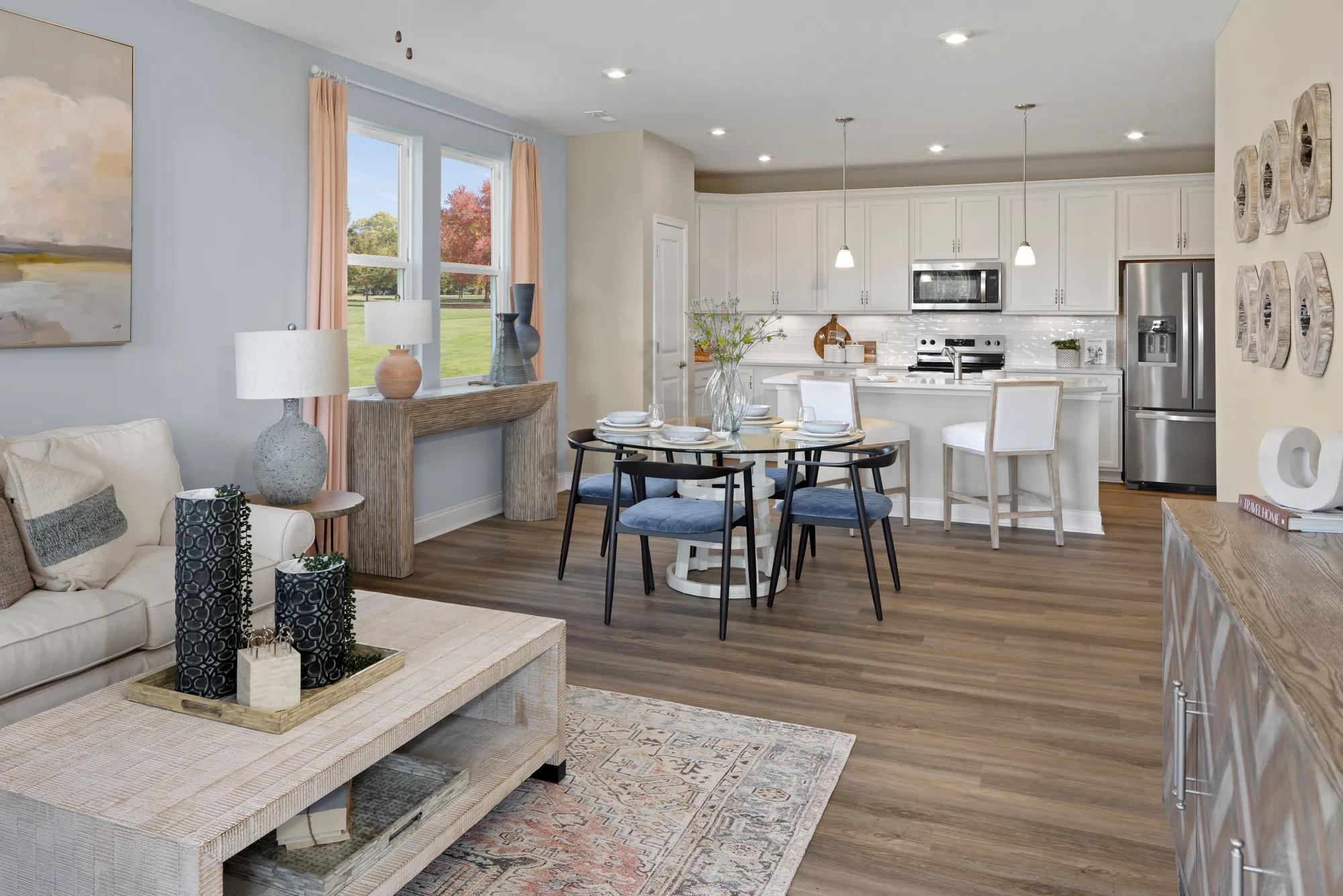 open concept family room, kitchen and dining area