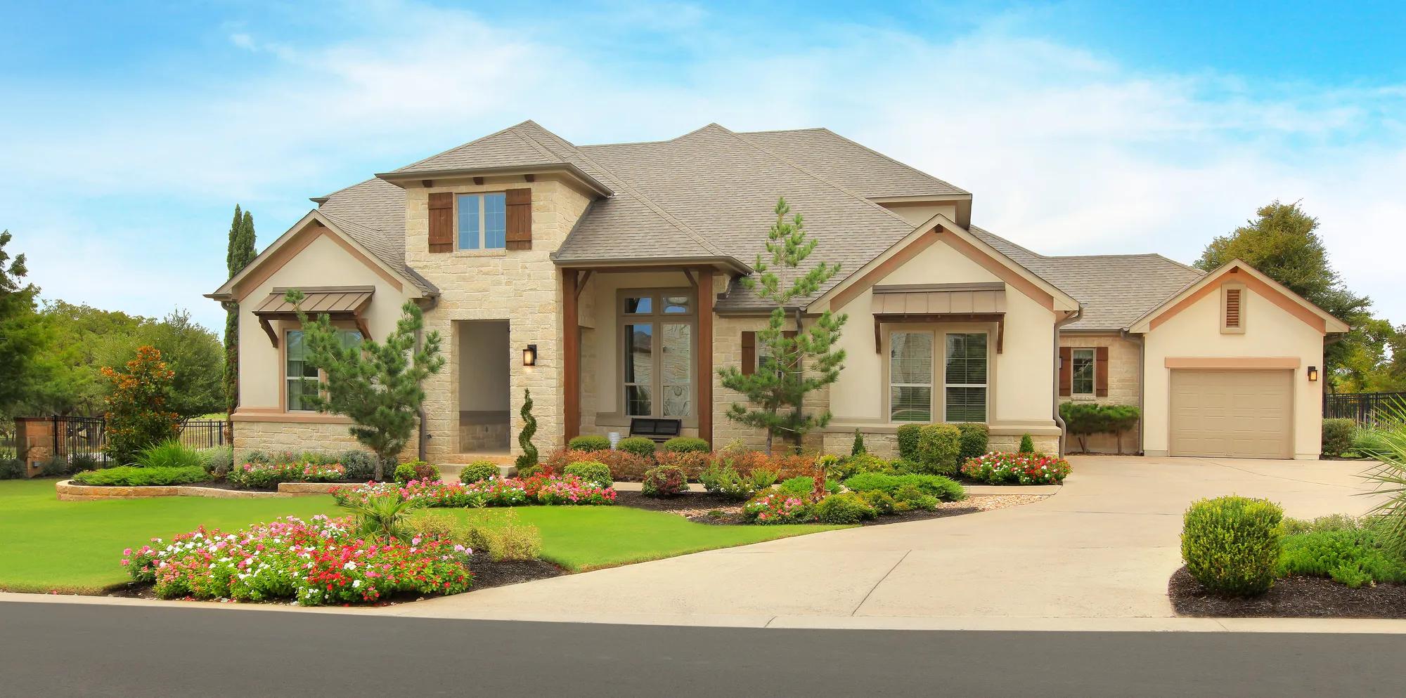 new home with stone and stucco exterior