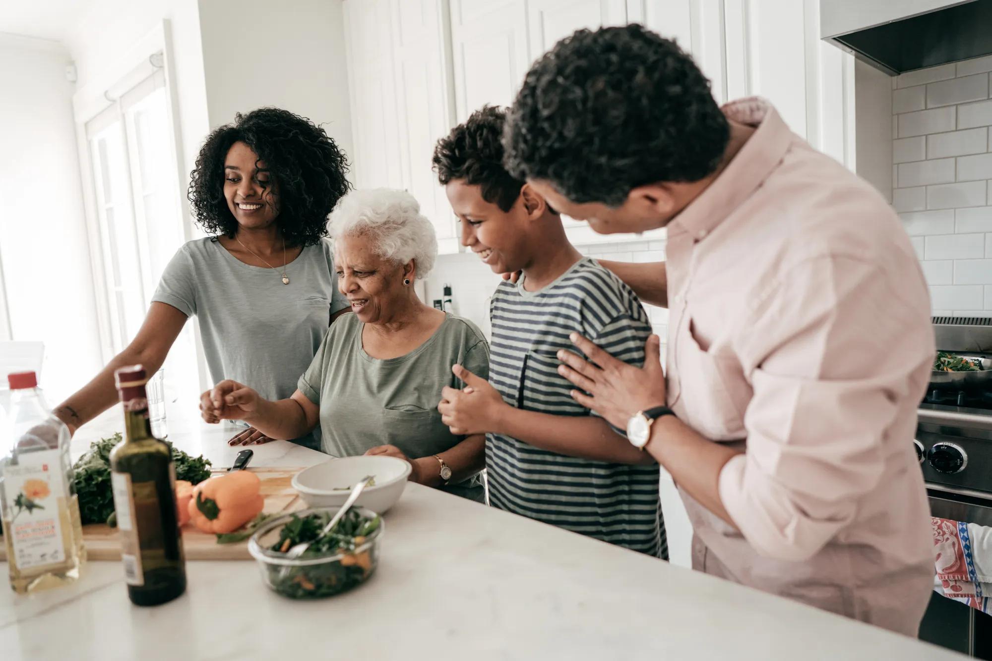 Family cooking together in kitchen