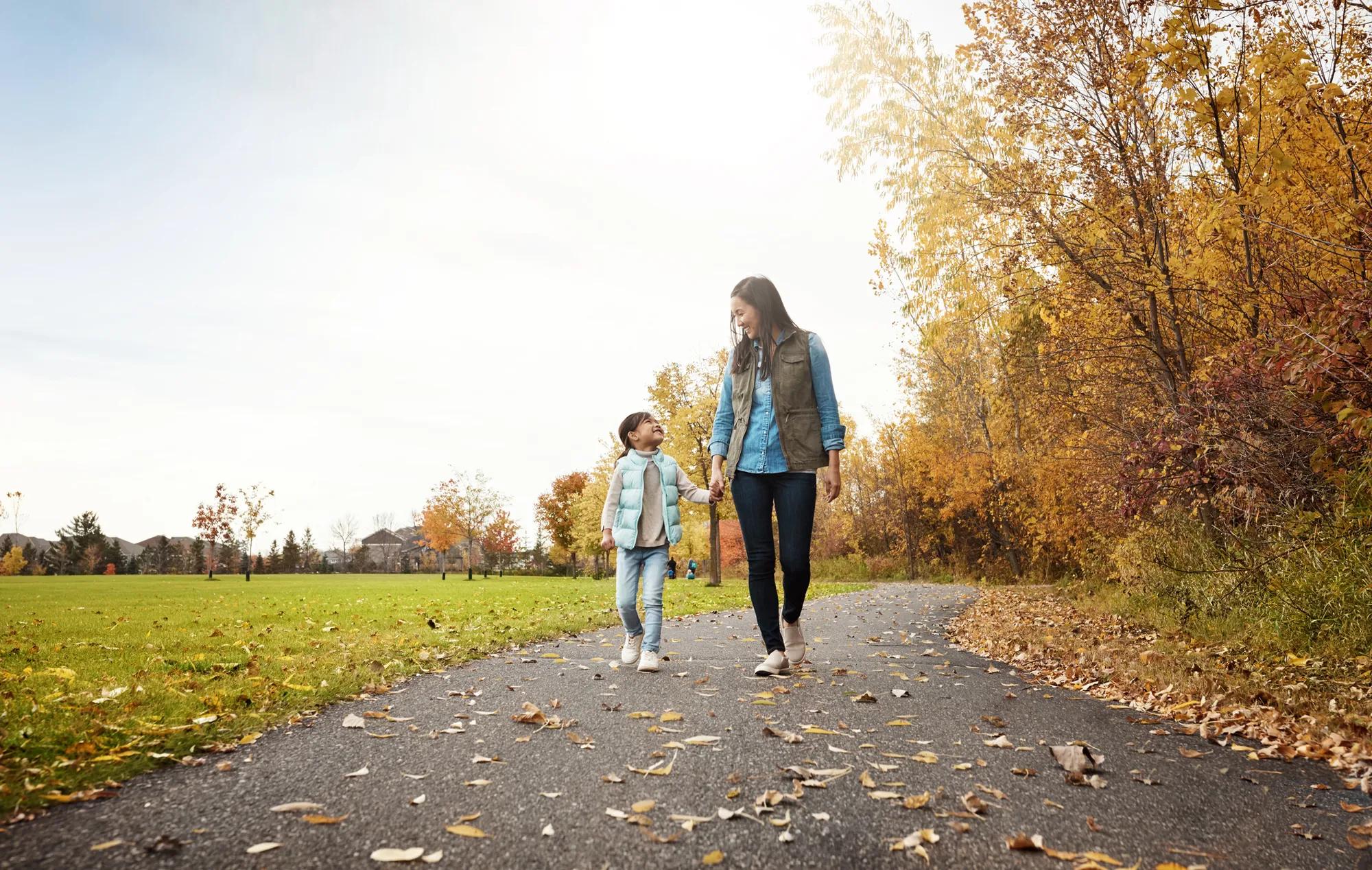 Mother and son on walk, autumn