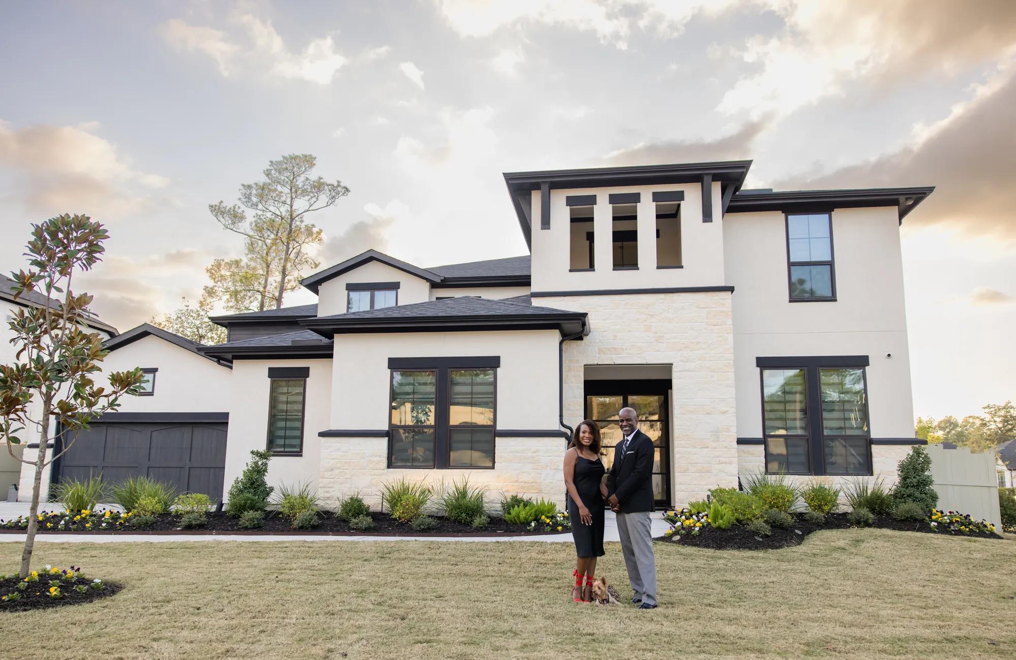 New homeowners enjoying their beautiful brick Drees Home