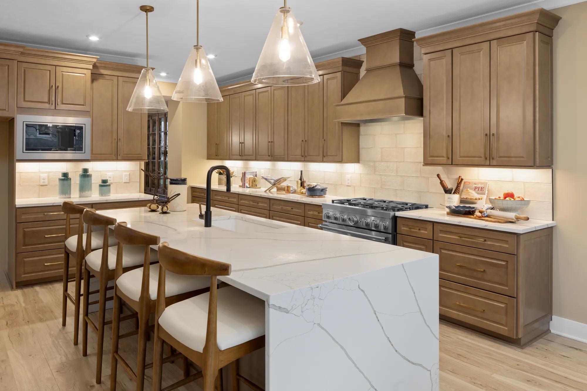 new home kitchen with light wood cabinets