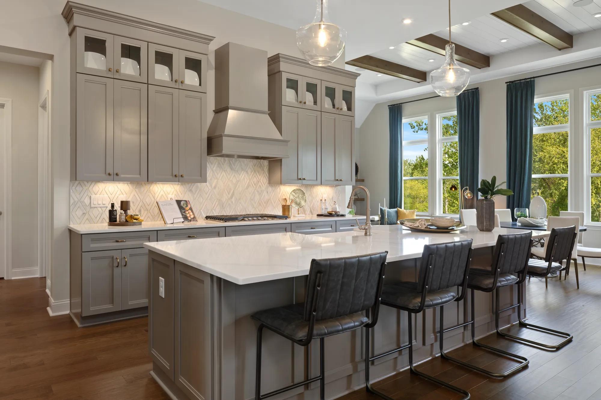 kitchen with gray cabinets and large island