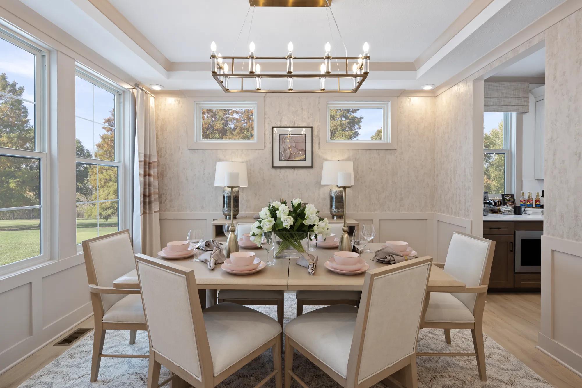 custom home dining room with tray ceiling