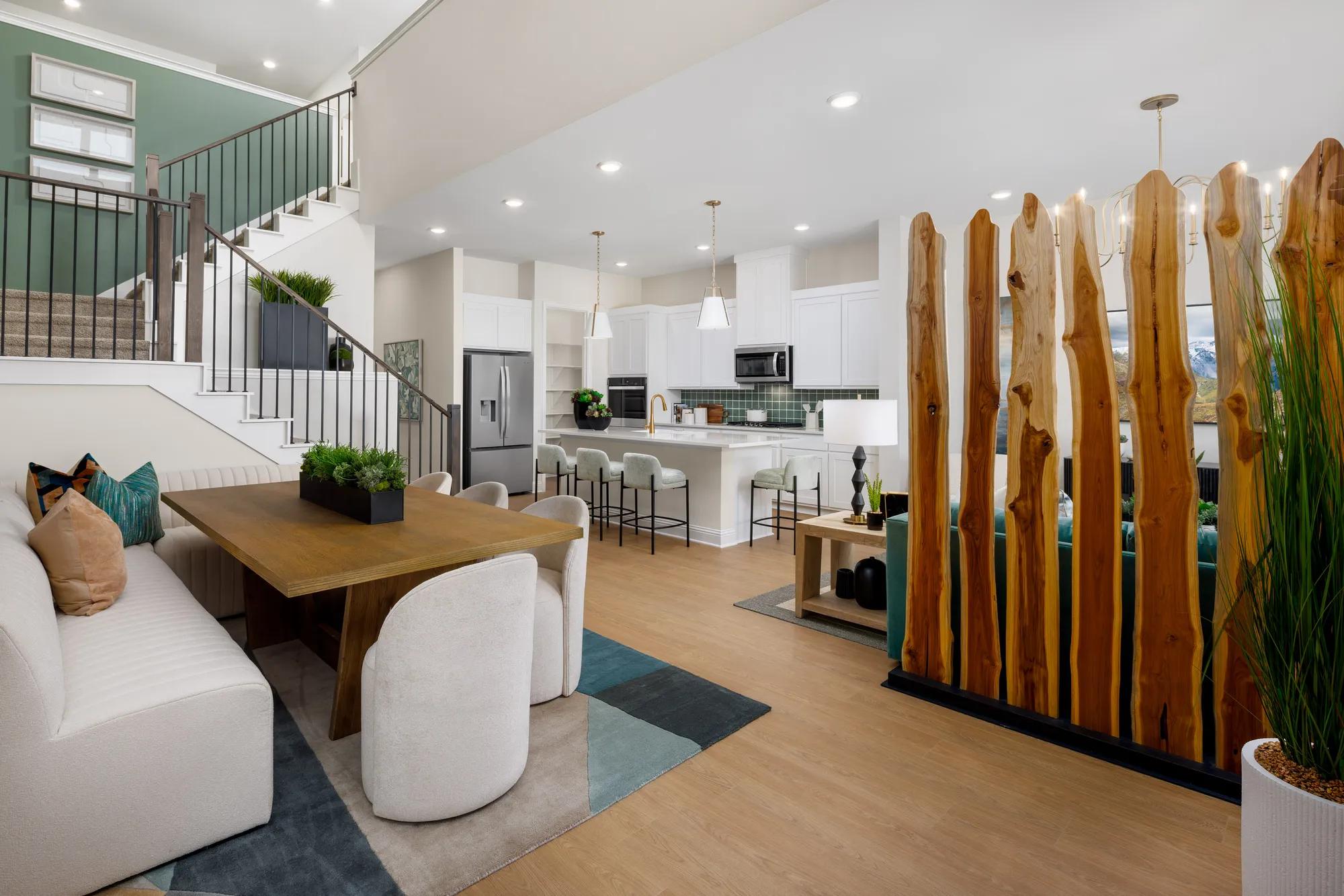 New townhome open floor plan two-story dining room with open staircase