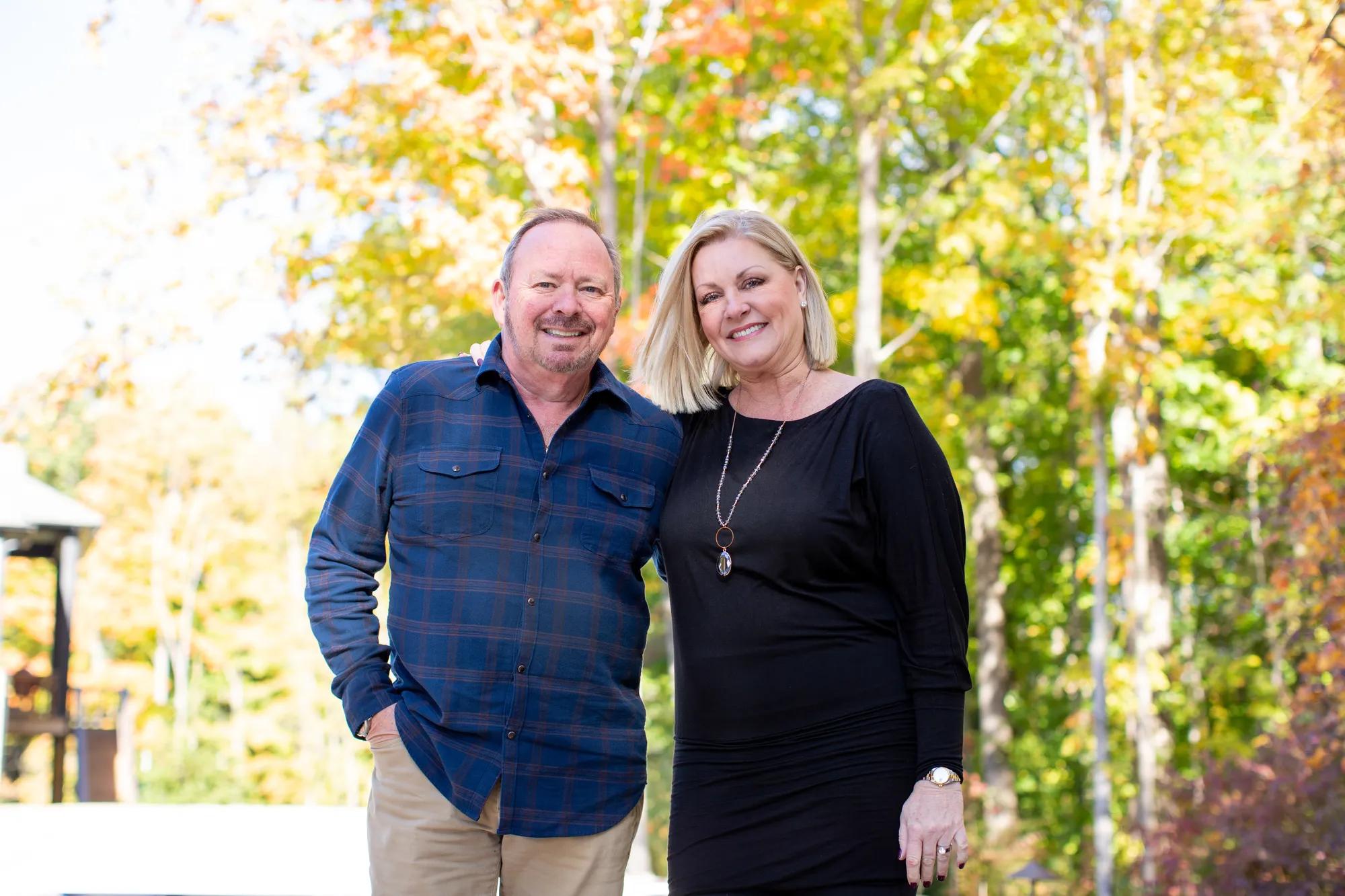 New homeowners enjoying the woodlands around their Crestwood home