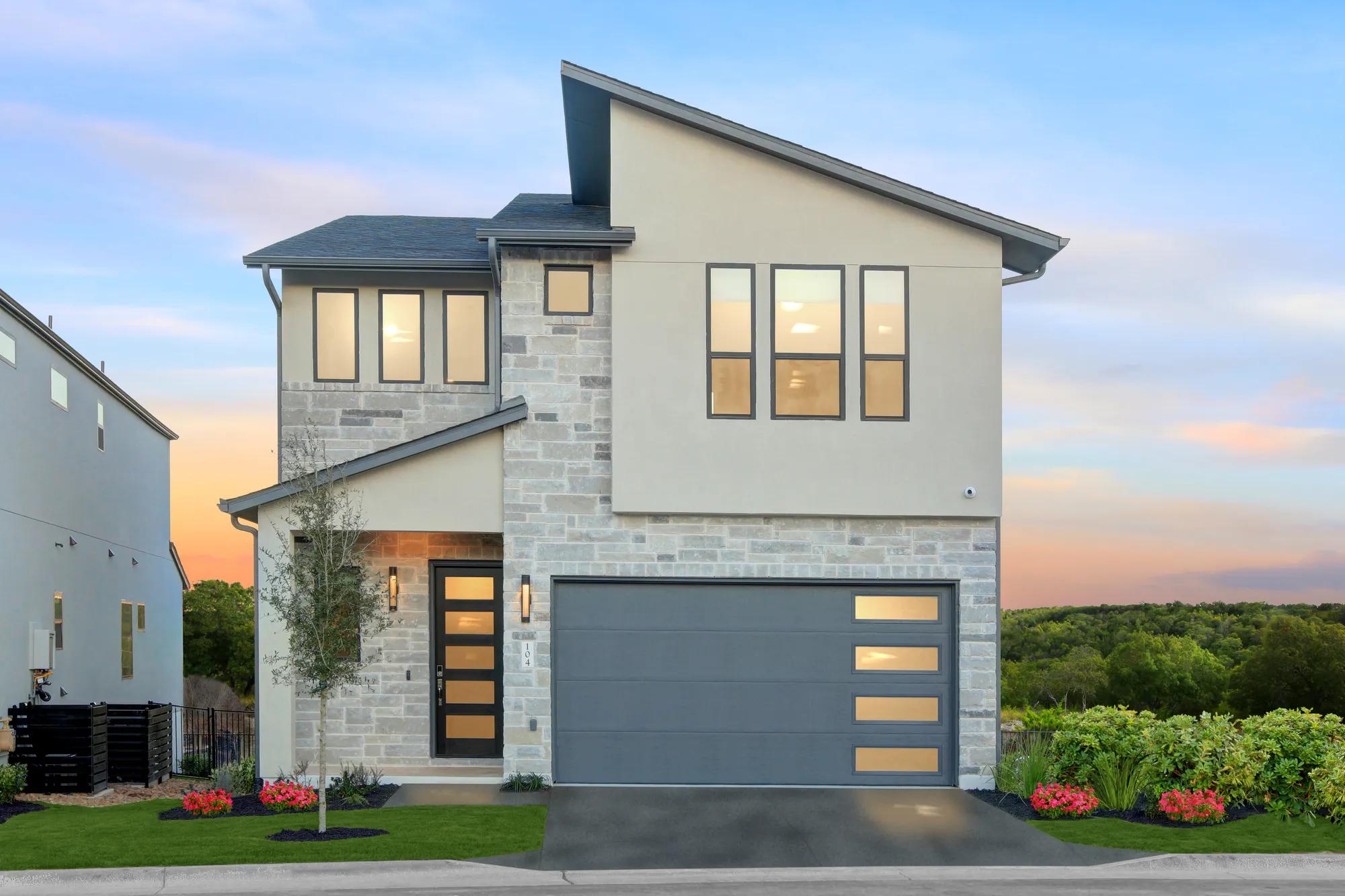 Custom home with modern stone and stucco exterior