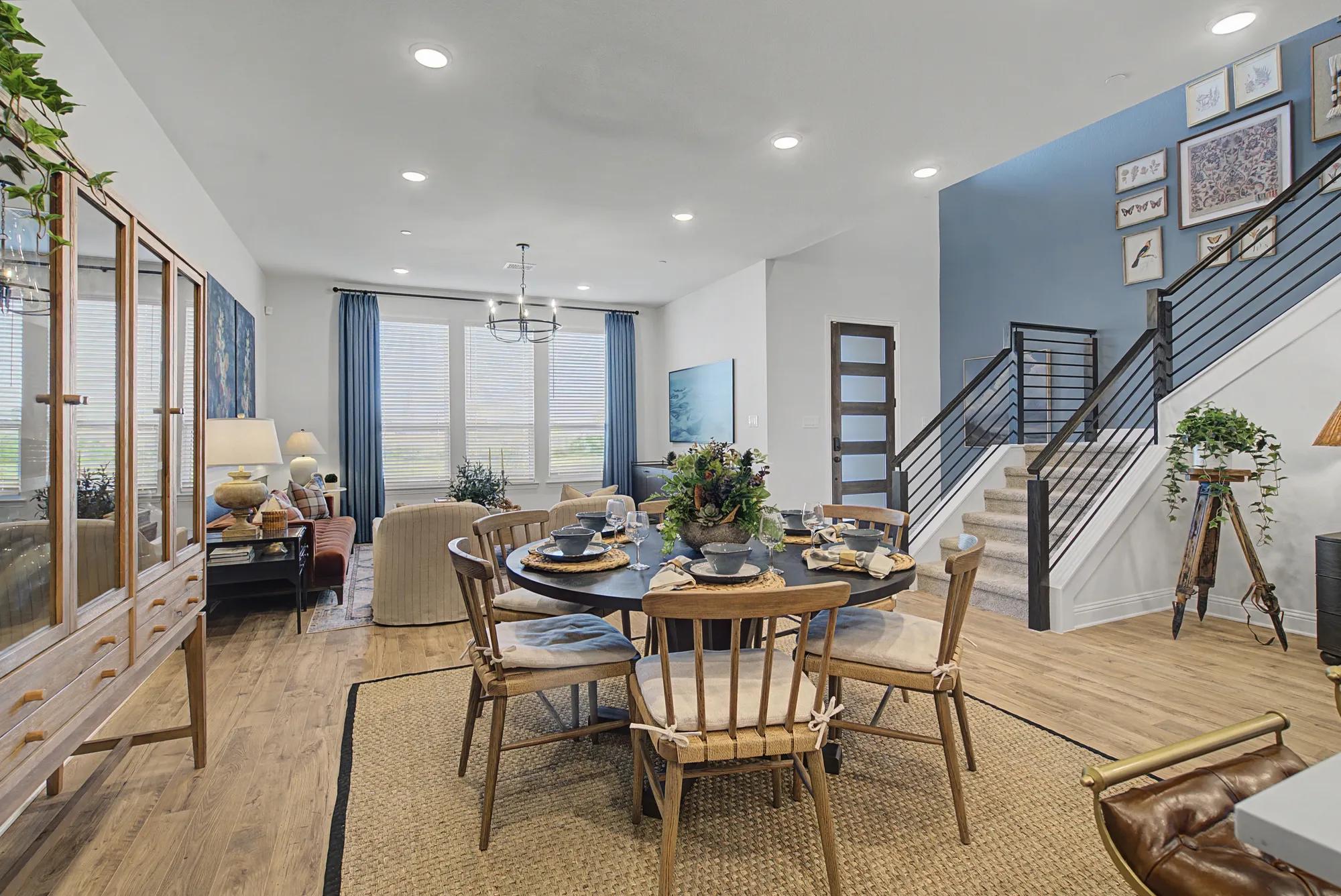 New townhome open floor plan dining room, family room and two story foyer