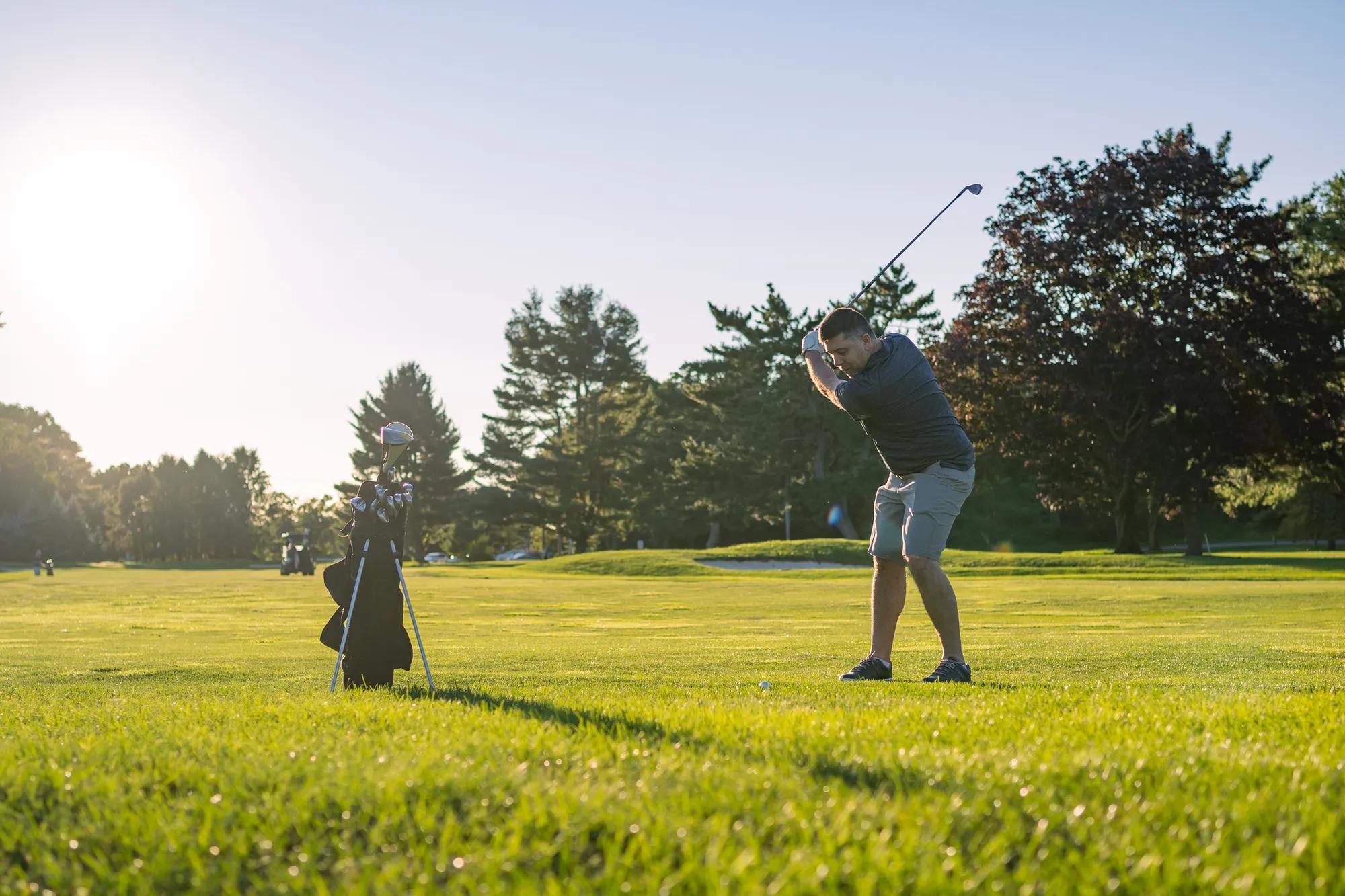Man playing golf