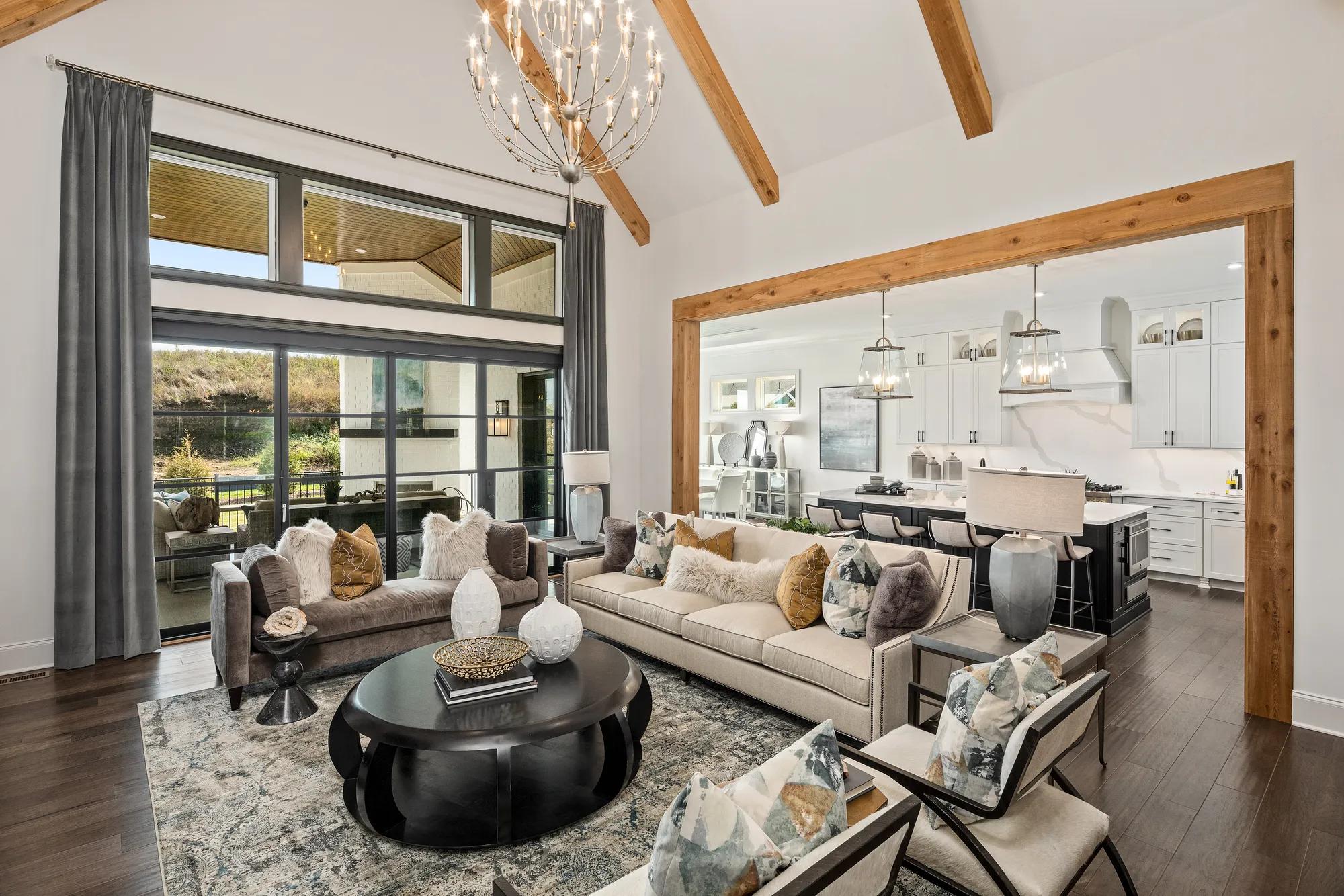 family room with vaulted beam ceiling
