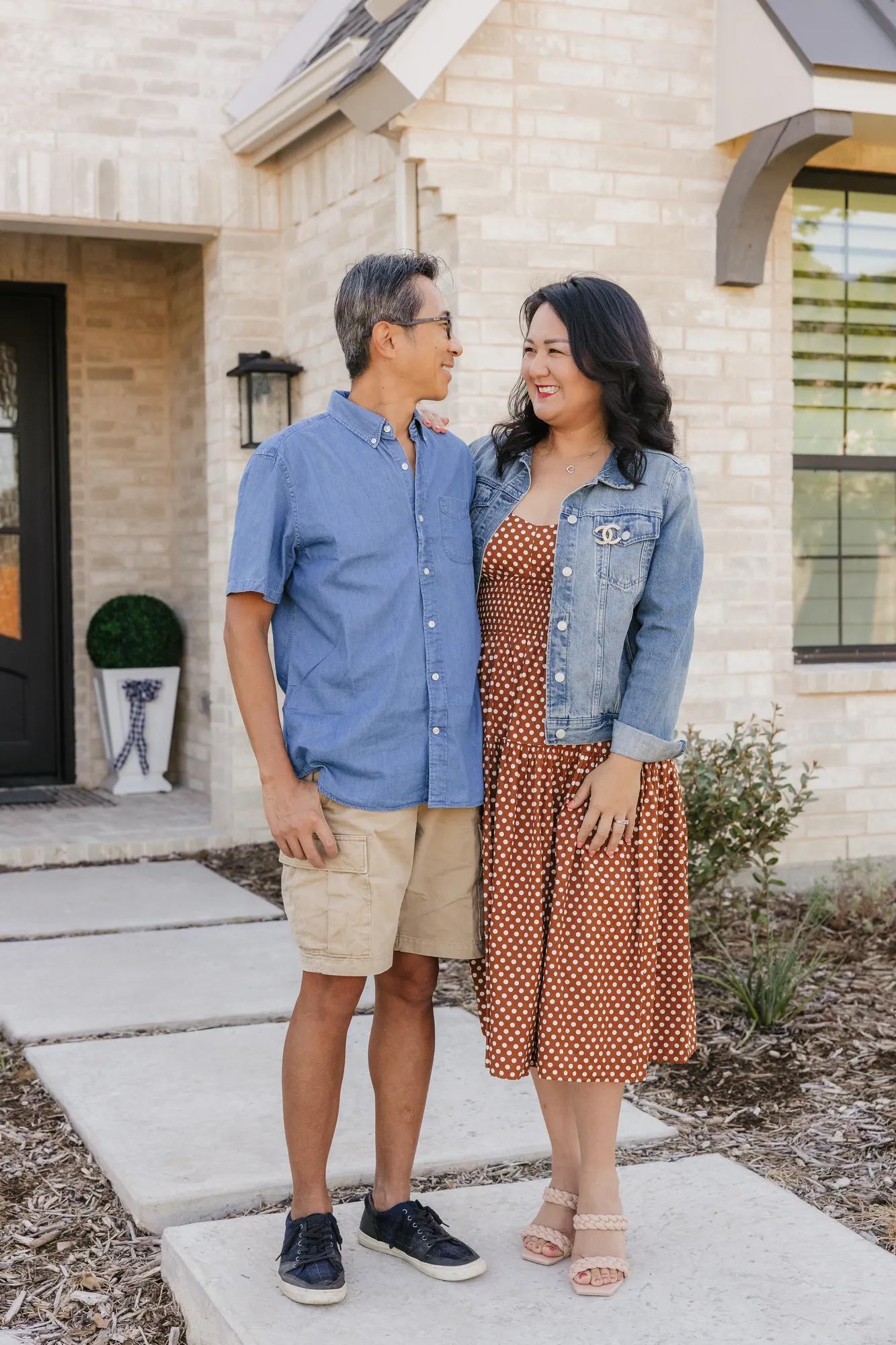 New homeowners enjoying a beautiful day with a stunning view of their Drees home