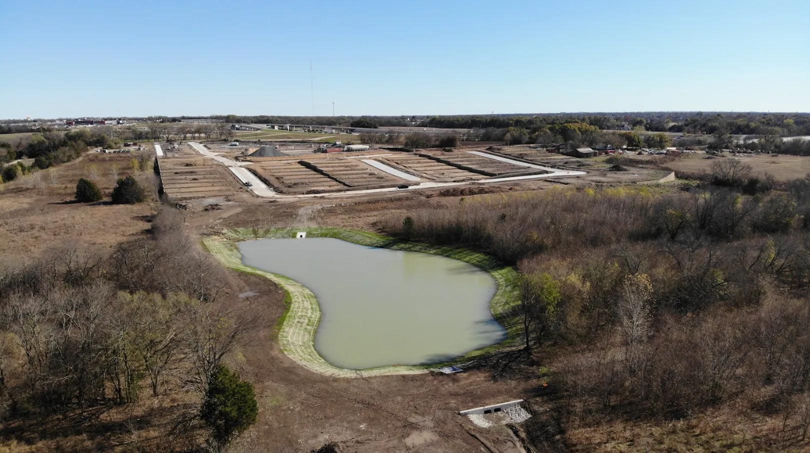 Aerial view of pond at Creek View in Melissa, TX