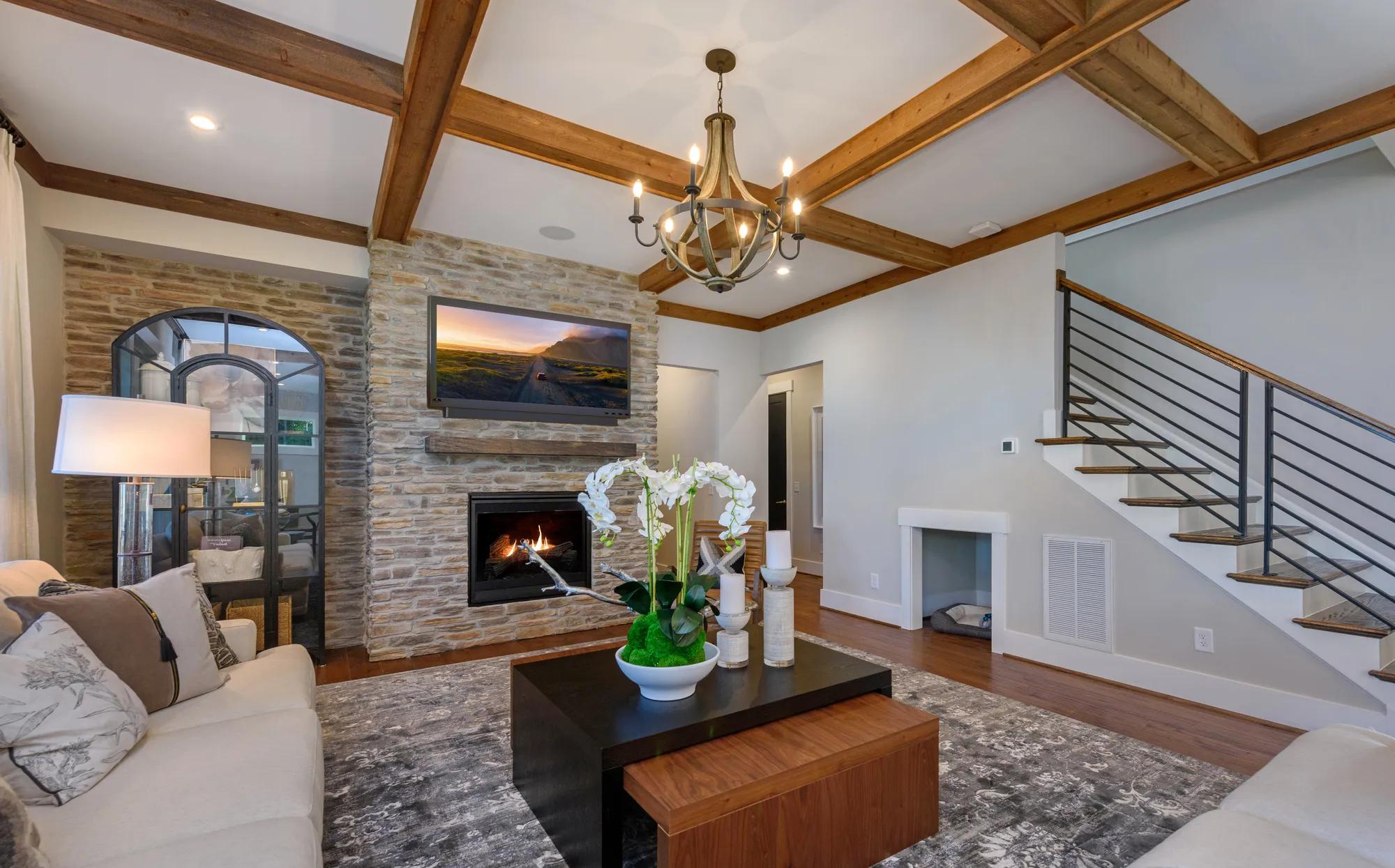 family room with stone fireplace