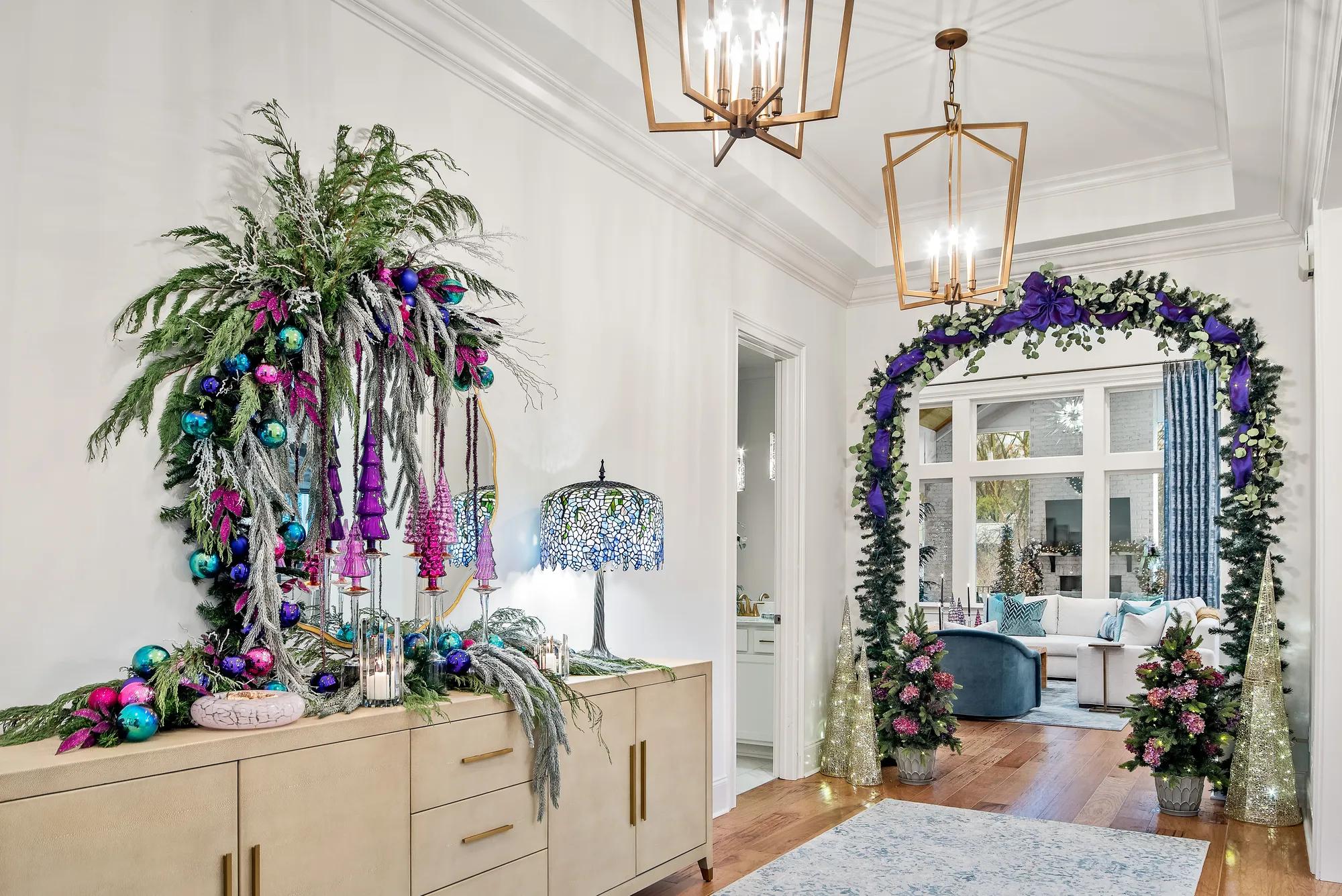 Drees home foyer with archway garland