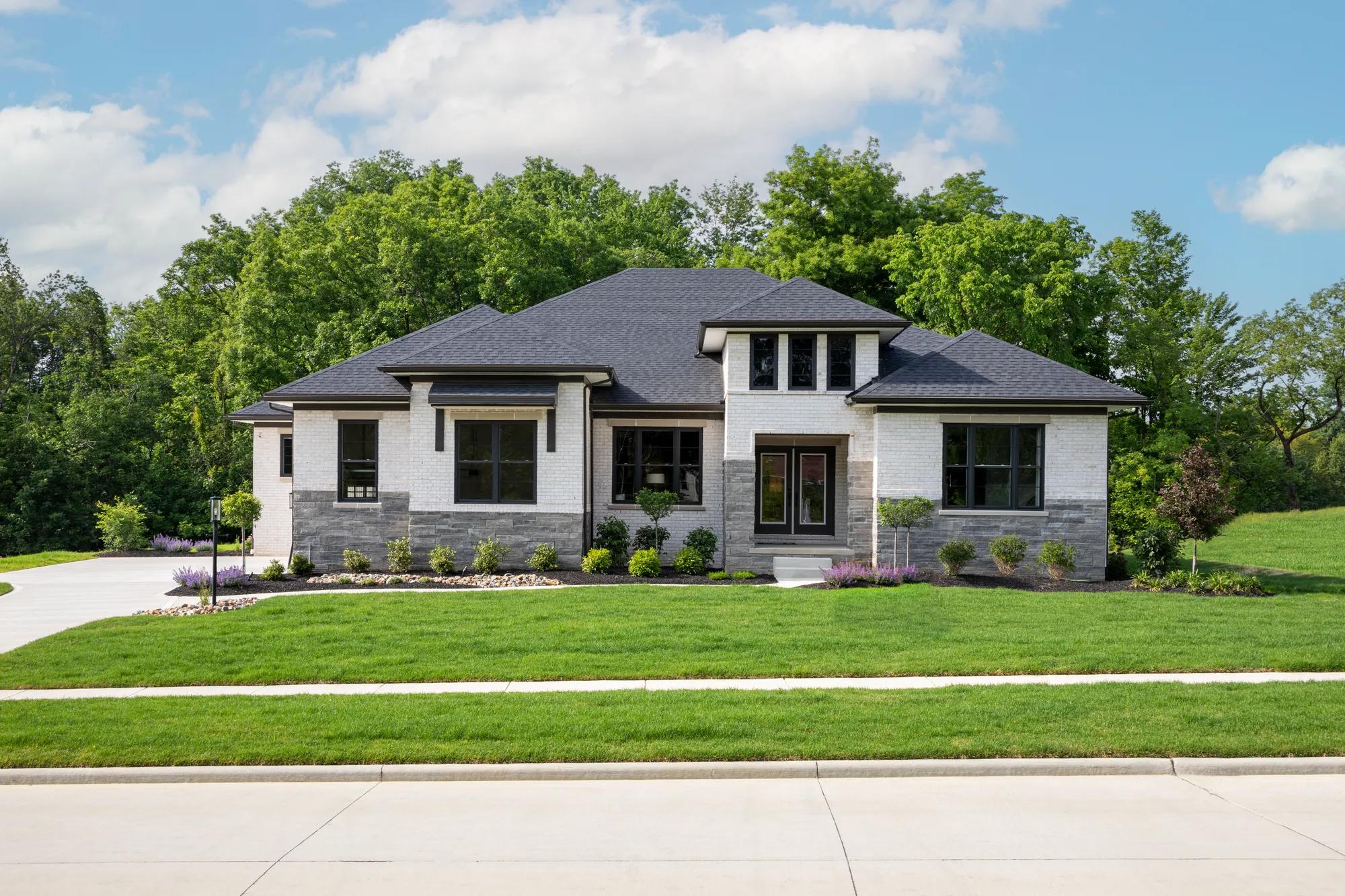 new home with brick and stone exterior