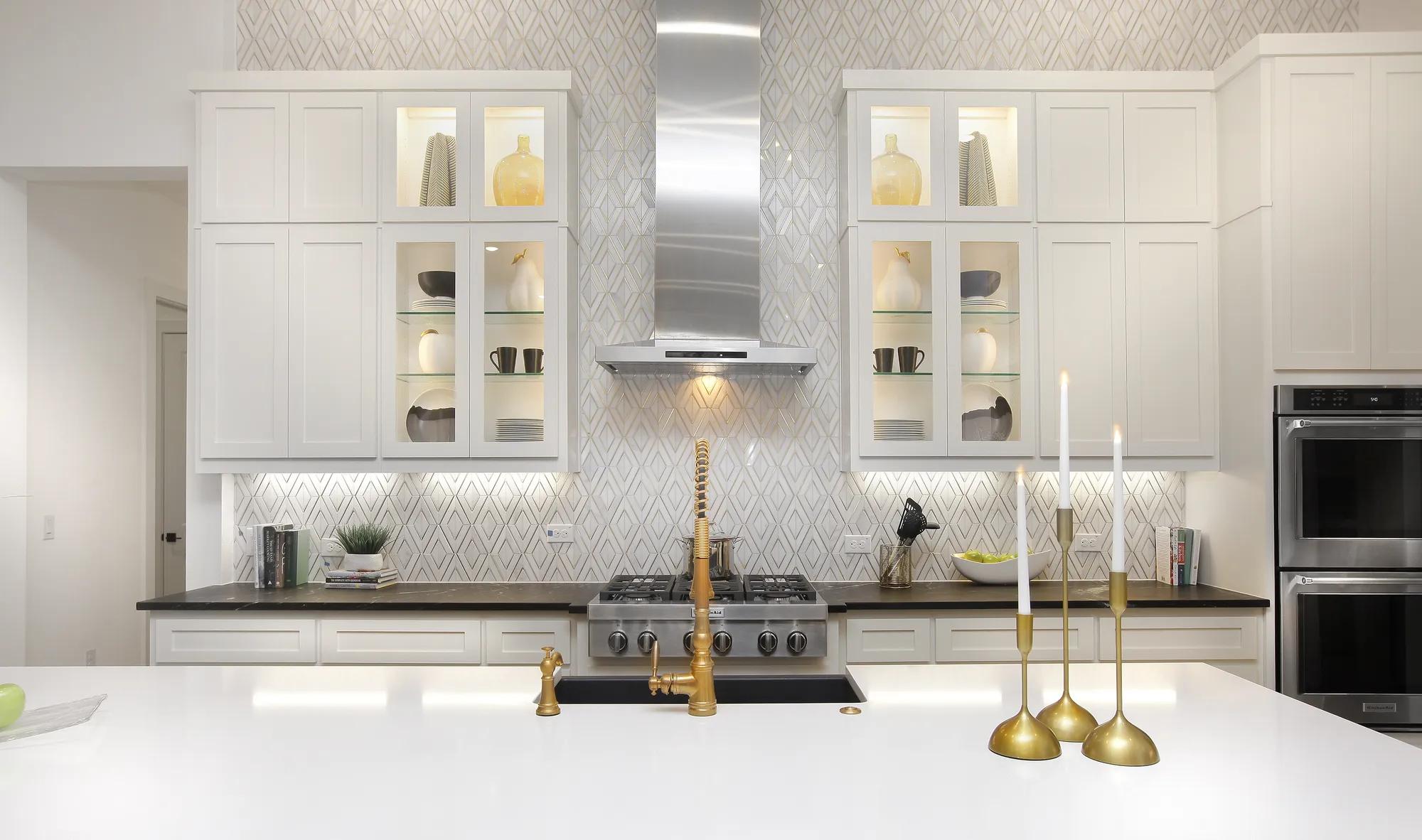 kitchen with stainless steel range hood and gas cooktop