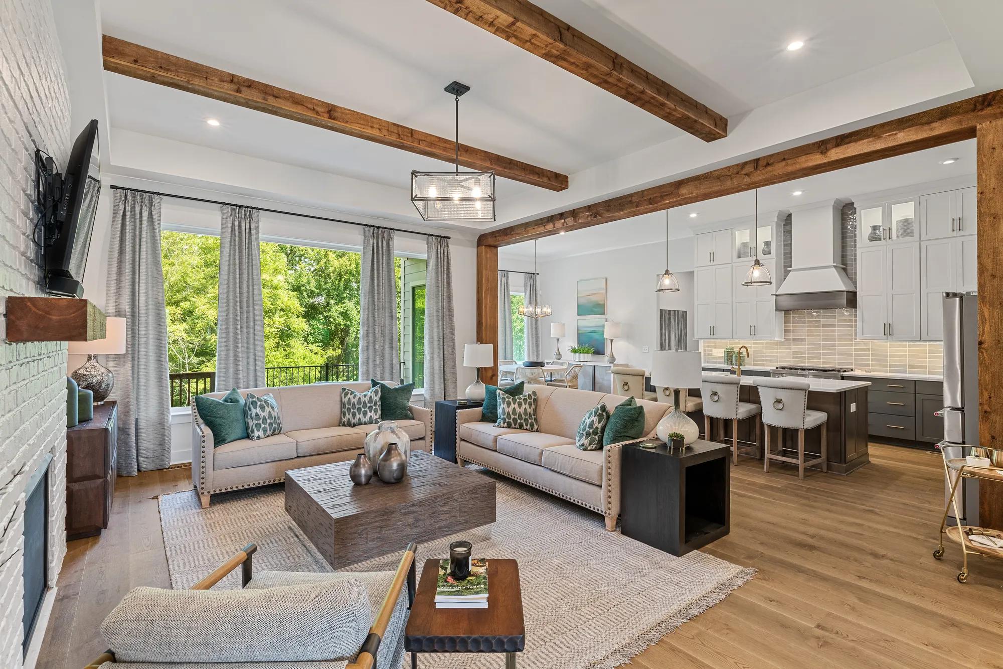 family room with beam ceiling
