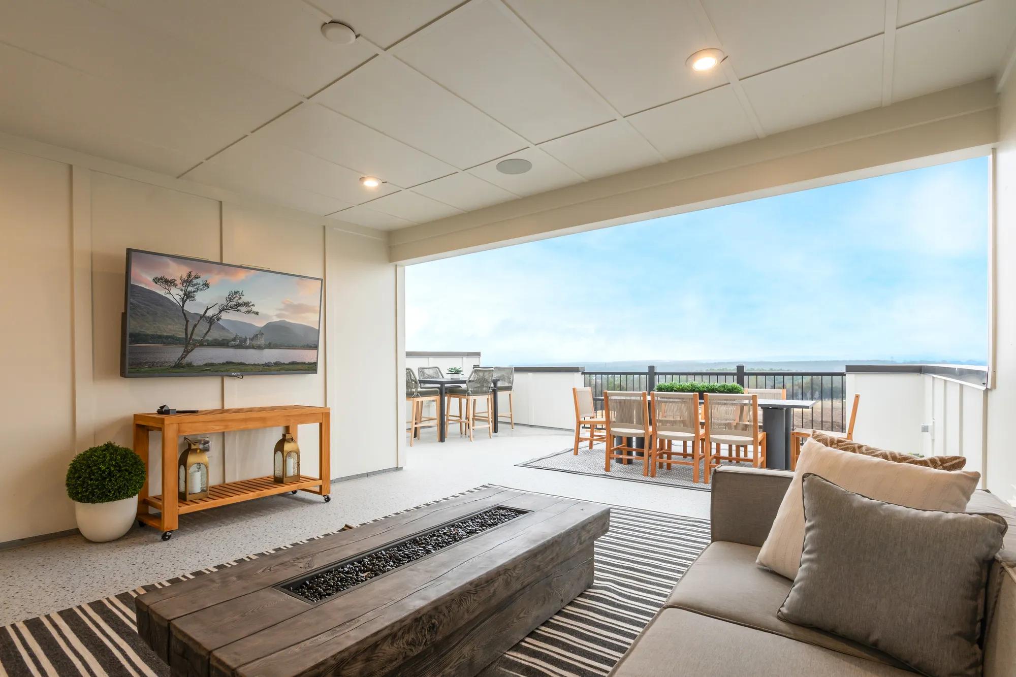 New construction townhome rooftop terrace with firepit