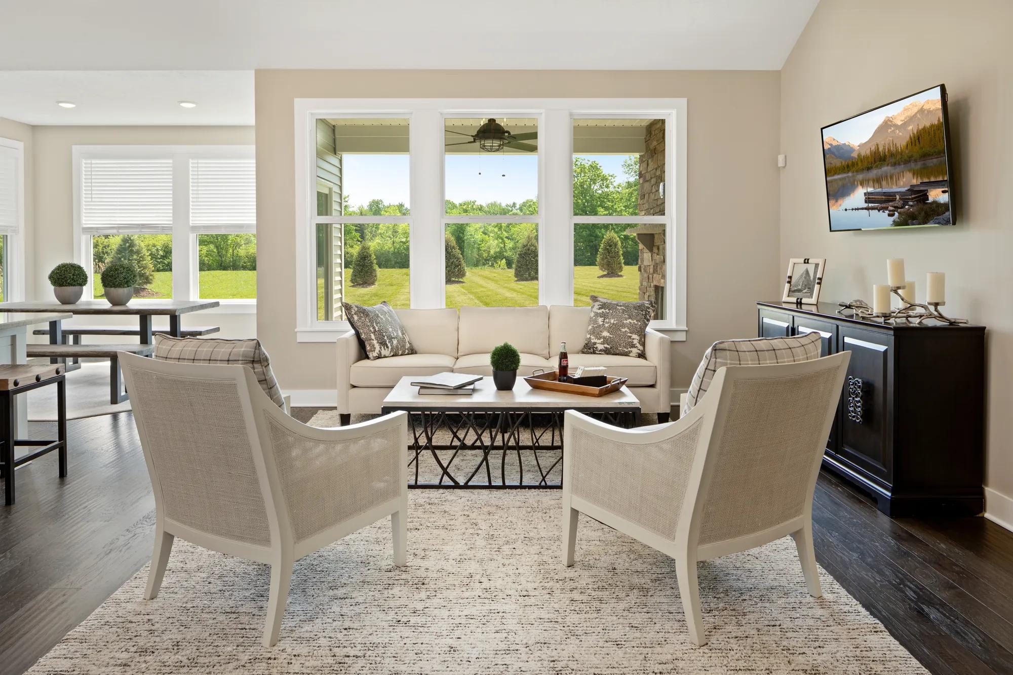 family room with wall of windows