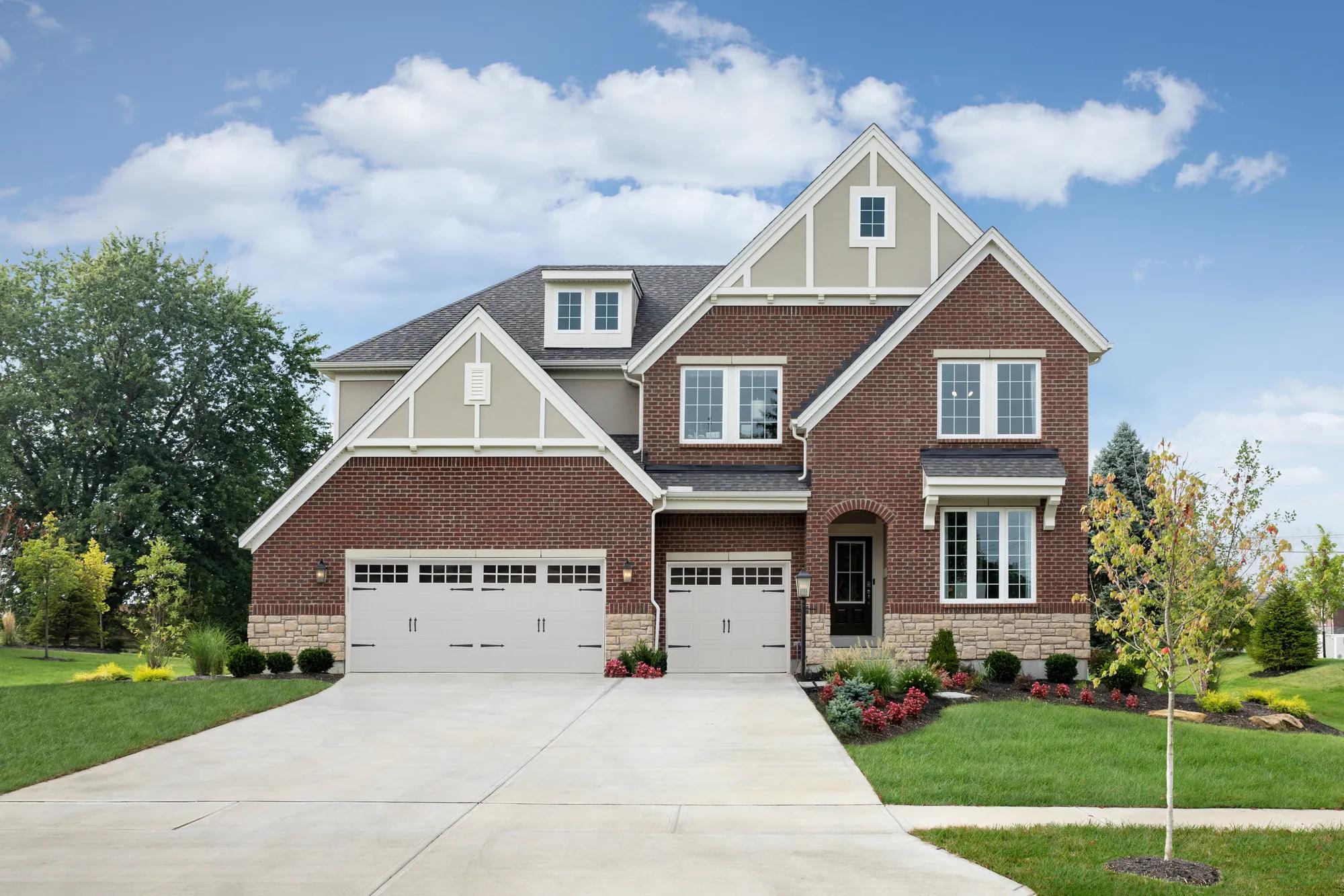 new home with brick, stone and stucco
