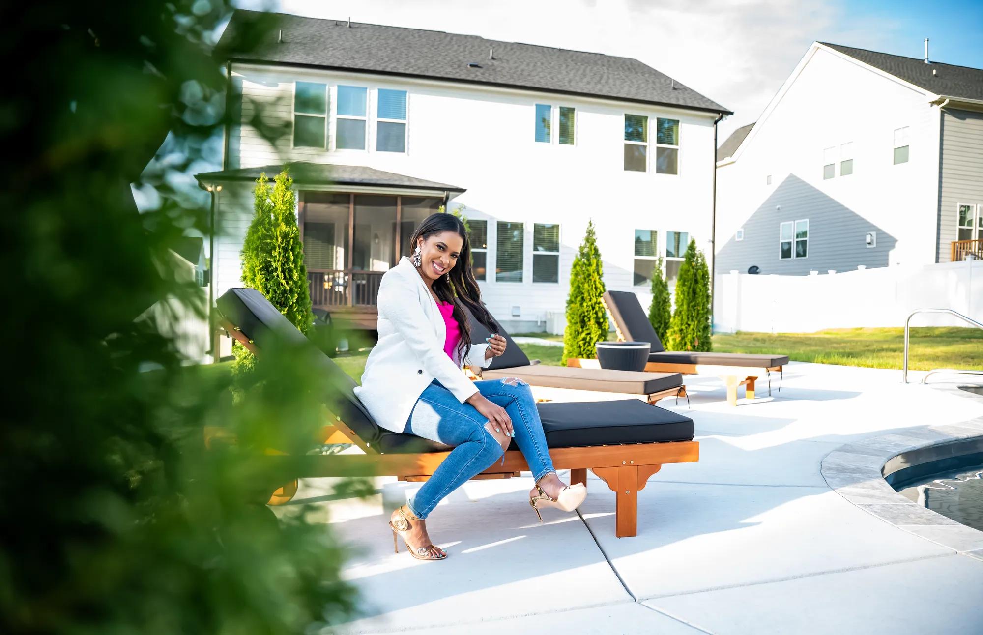 Homeowner in the backyard of the house