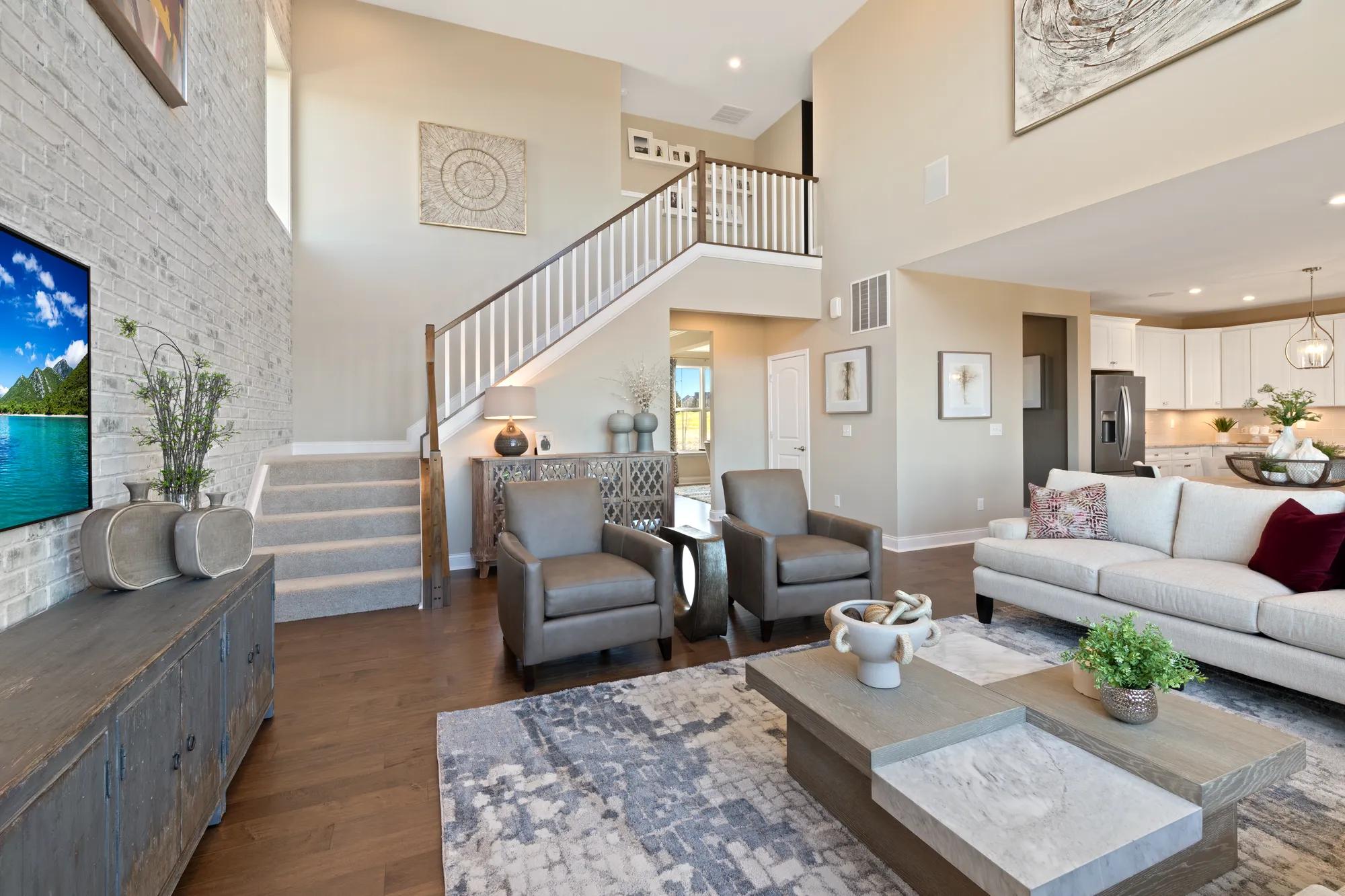 two-story family room with staircase
