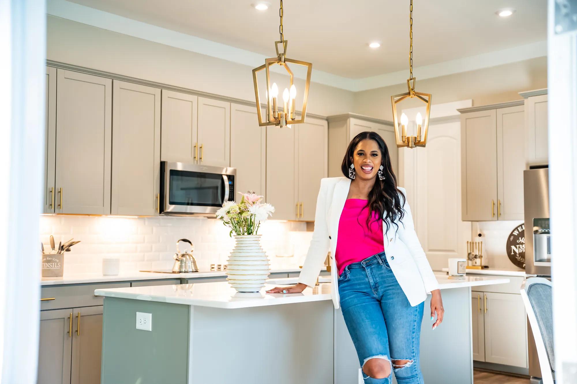 Homeowner in a beautiful sunlit kitchen